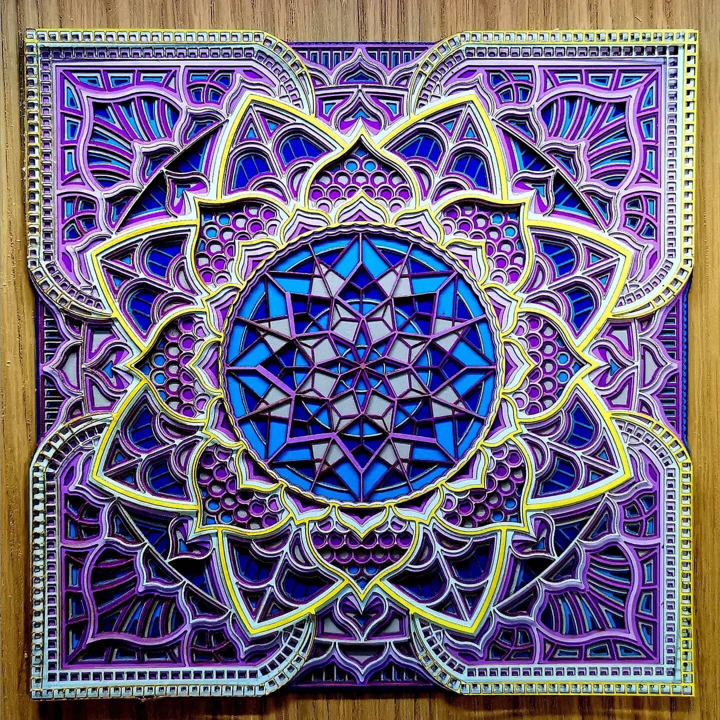Laser cut paper. 8x8 mandala with 2 layer 1/8 birch ply for frame

#lasercutting #laserengraving #laserart #lasercut #custommade #custom #mandalaart #lasercuttingmachine #co2laser #chinaco2laser