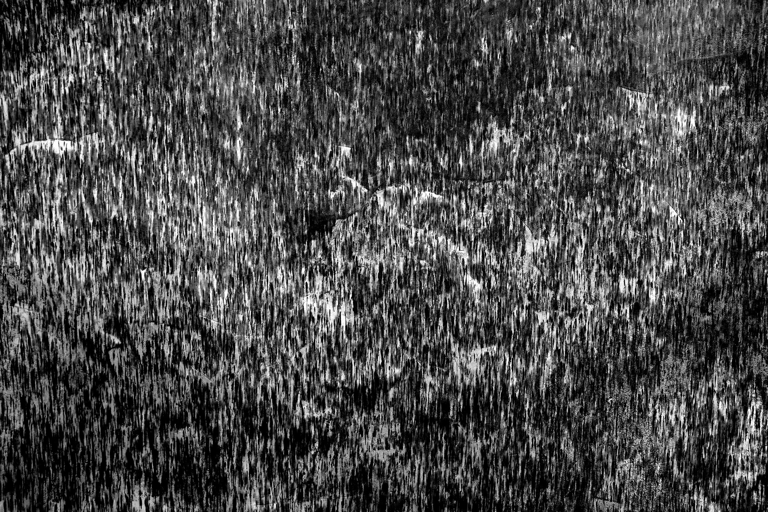 Untitled (black rain). Water on cement render, evaporated. 2.5 x 1.5m. 2021.