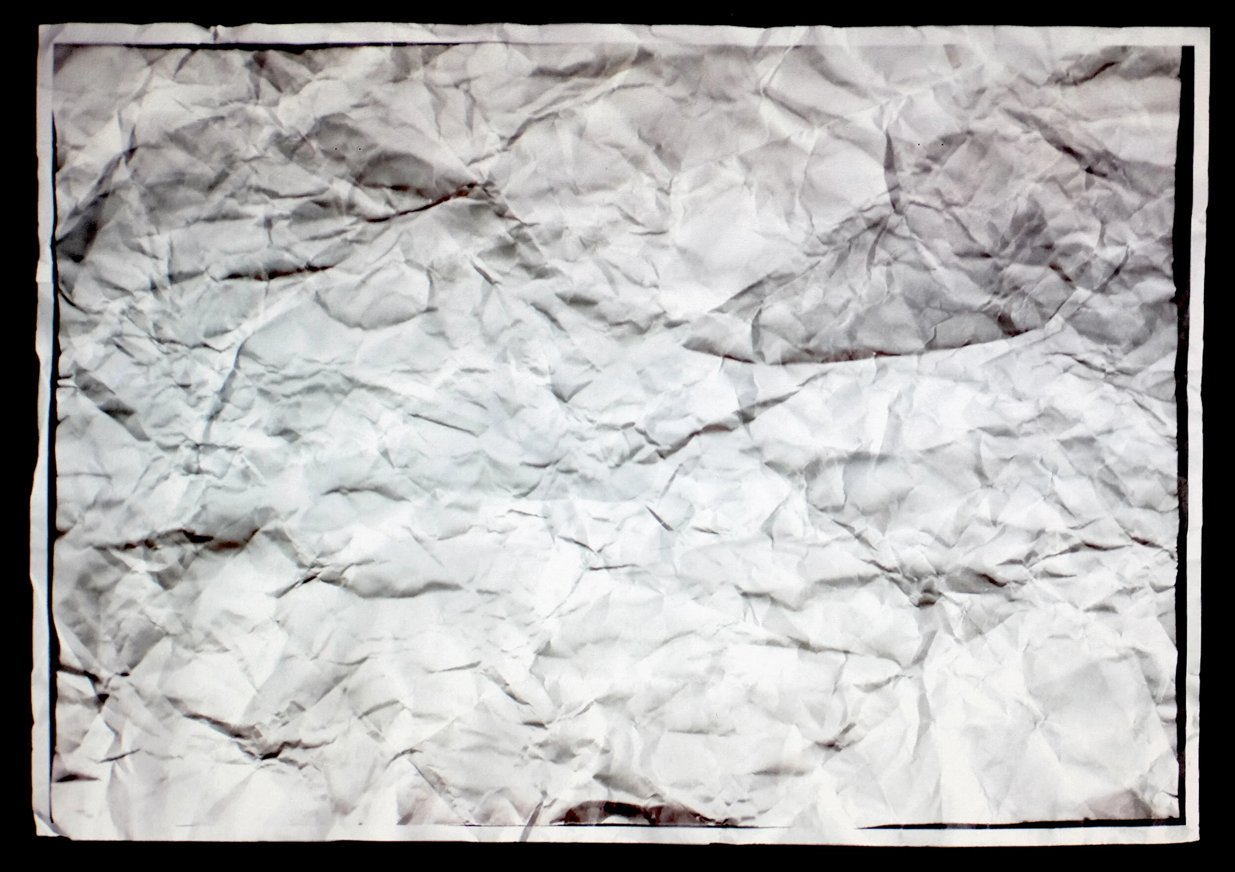 Blank. Arial photograph of Antarctica, crumpled, photographed, printed, scanned, projected. 2021.