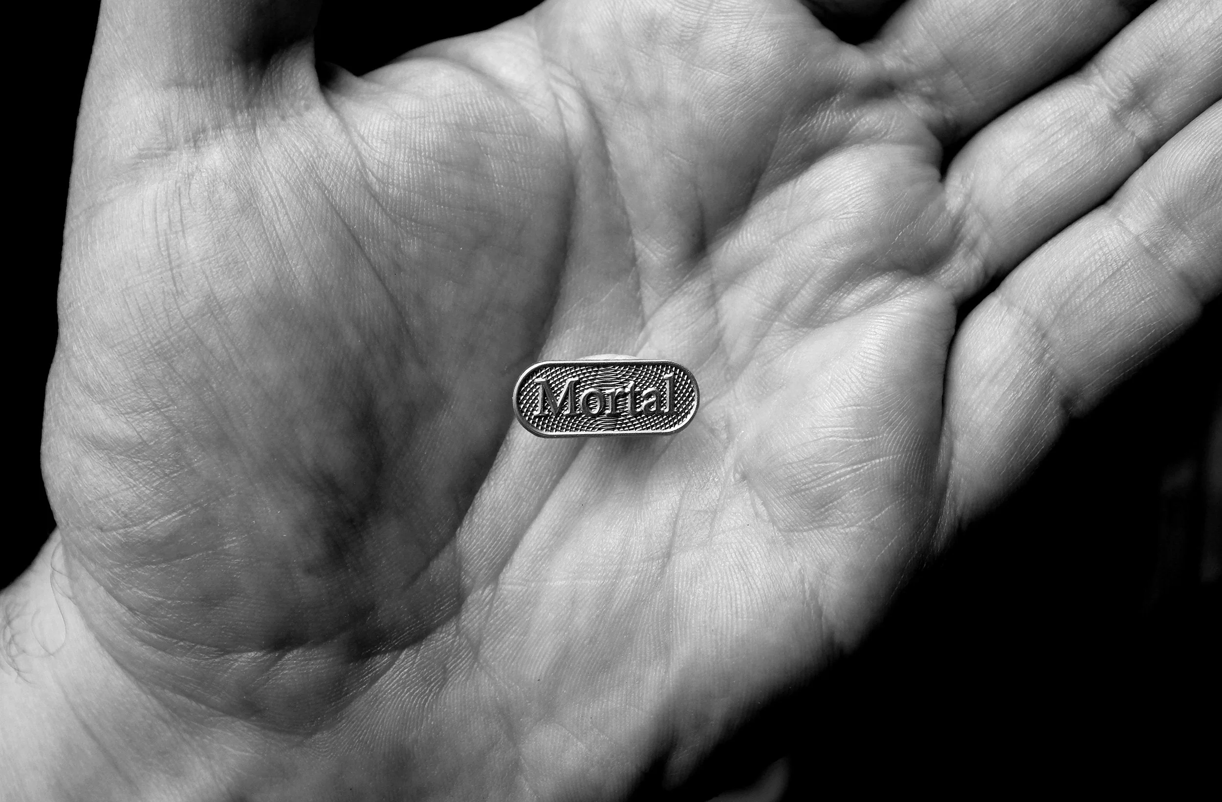 Mortal. Metal die struck pin. 2023