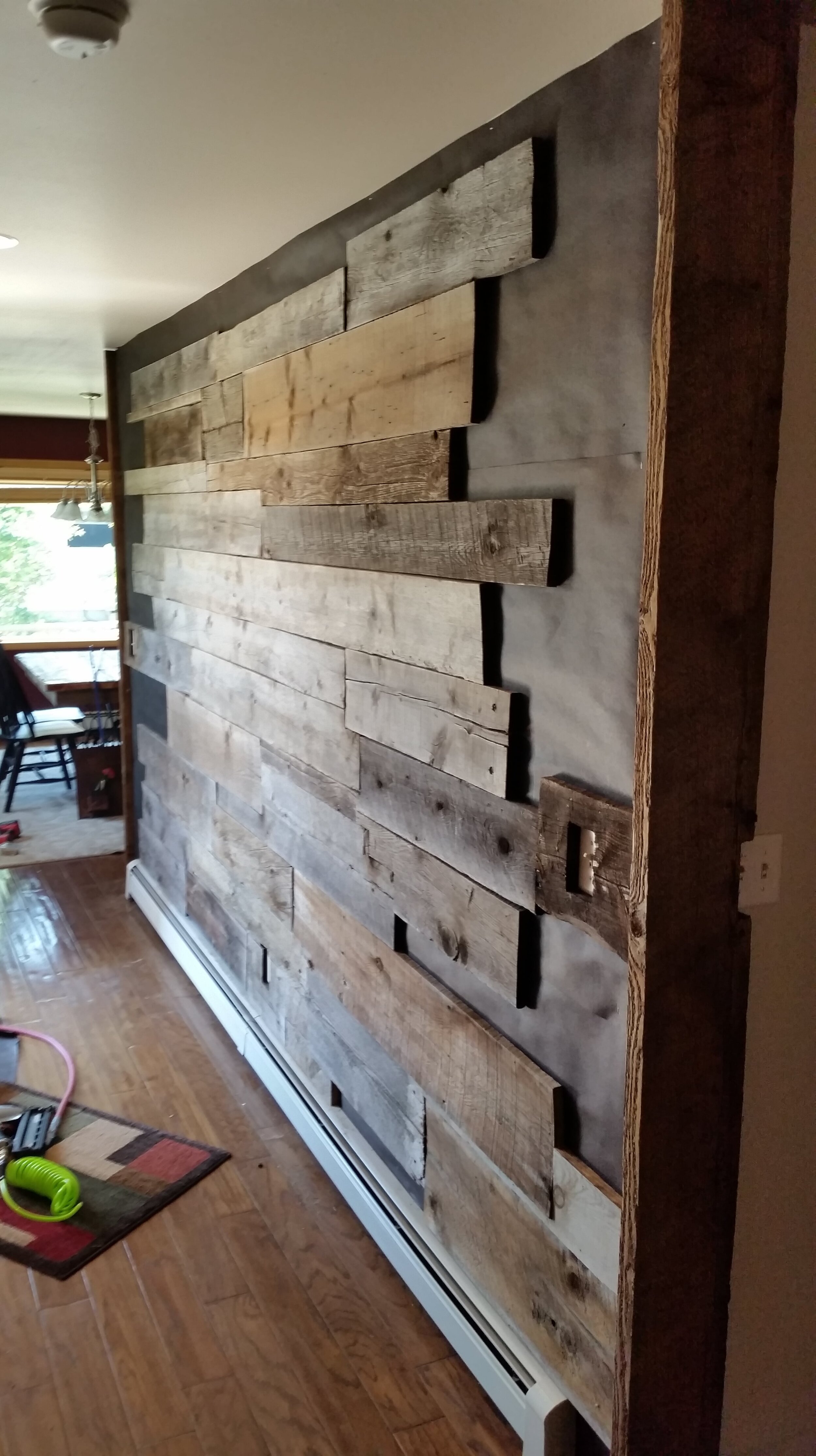 Barnwood wall install-min.jpg