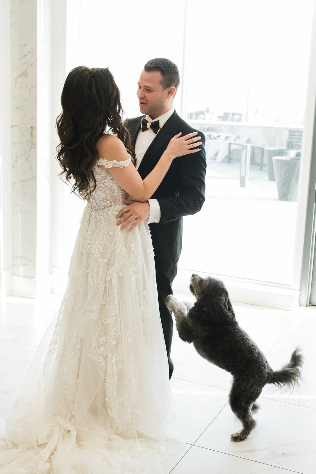 Bride and groom first look with dog