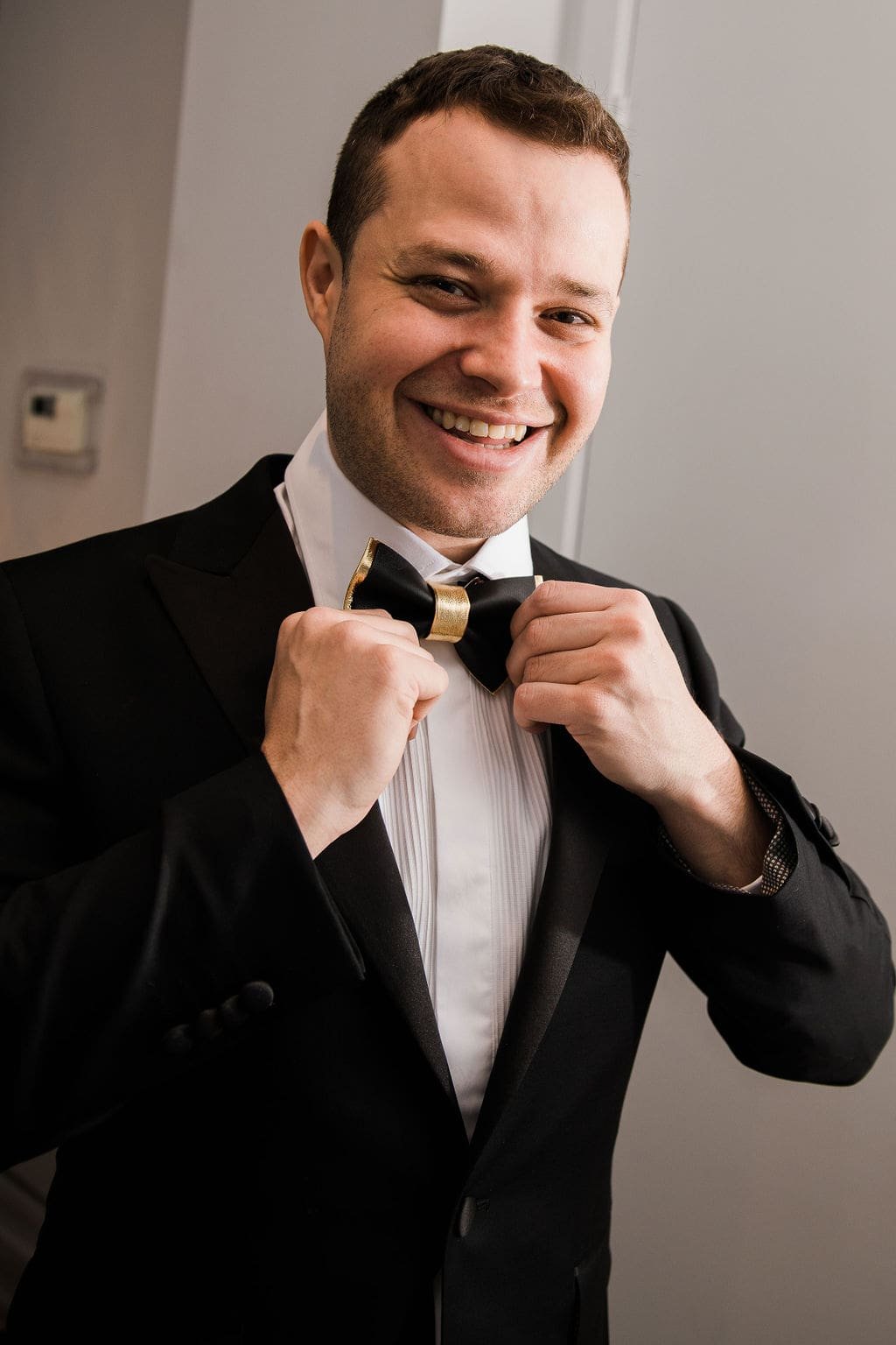 Toronto groom in black tuxedo with bowtie