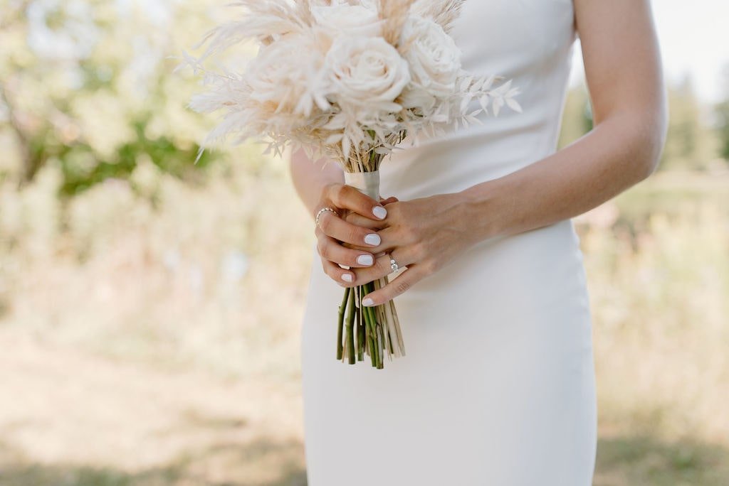 Neutral bridal bouquet with white roses &amp; dried florals