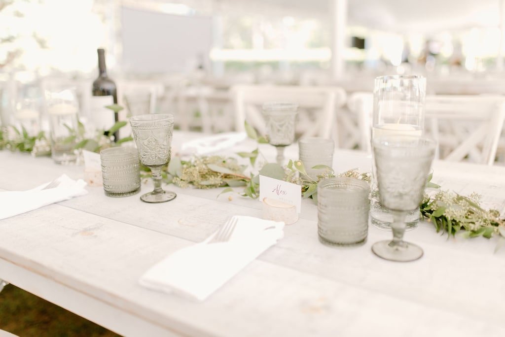 Simple wedding table place setting with water goblets