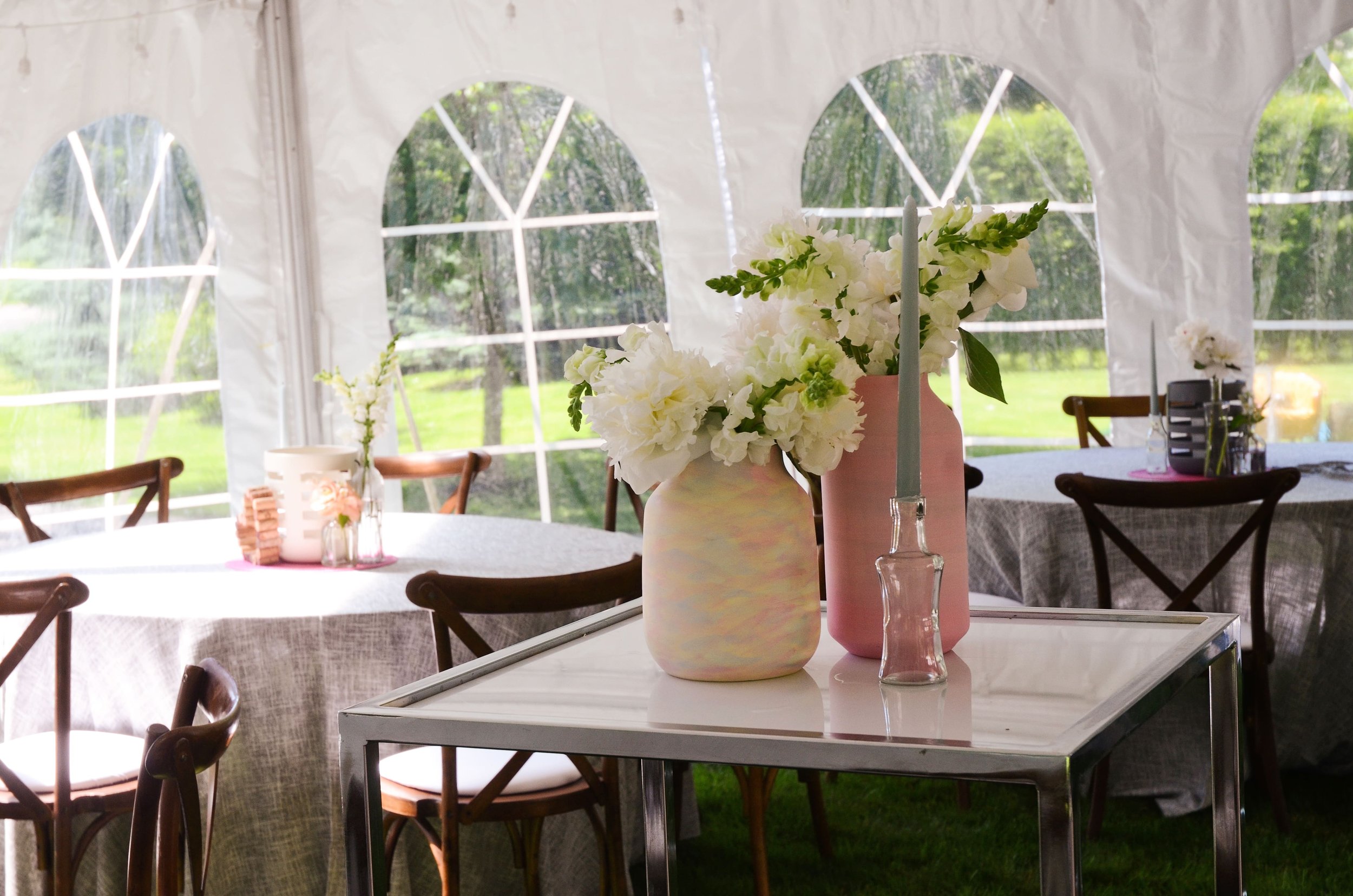 Backyard tented wedding reception decorations