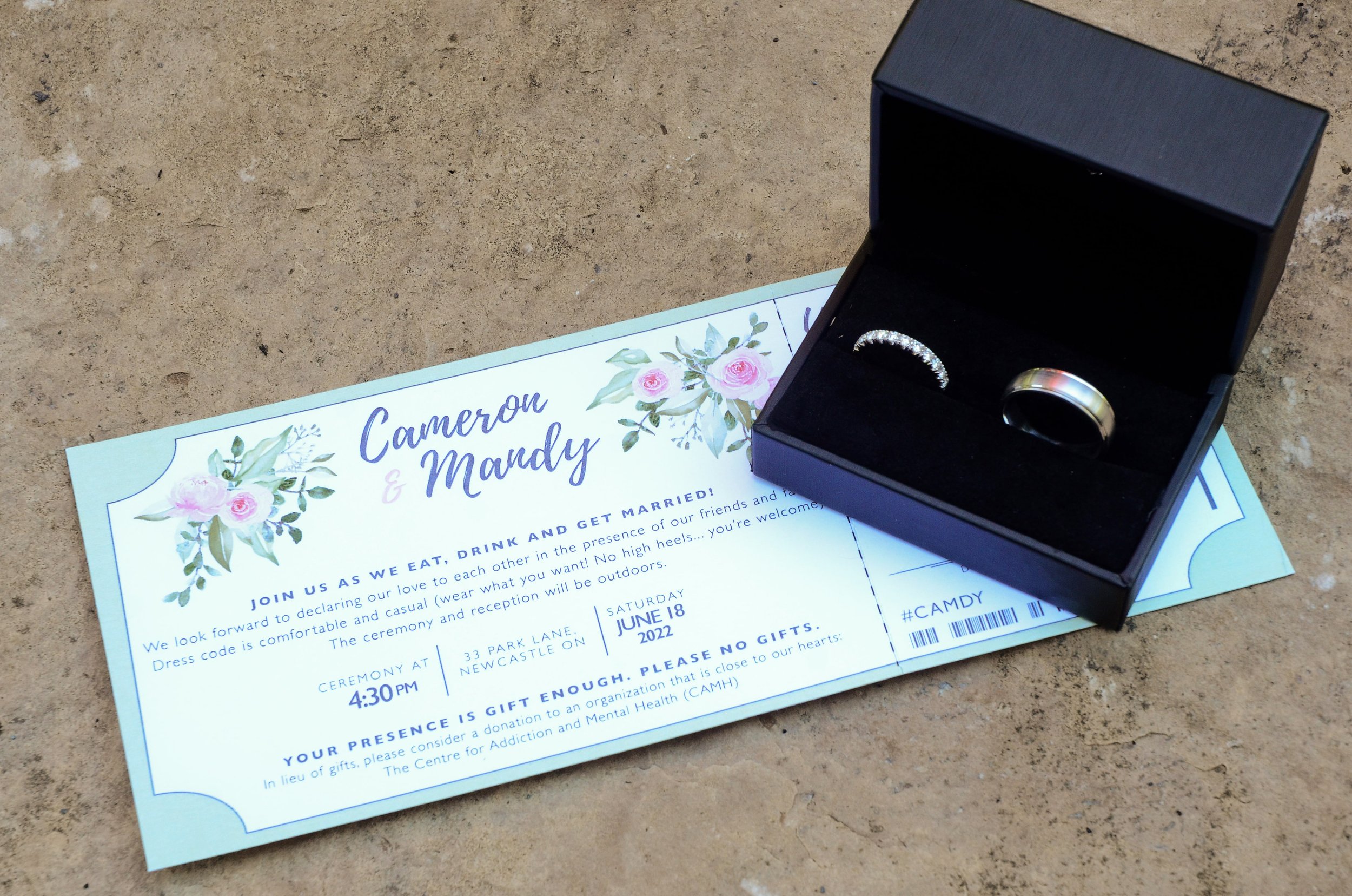 Wedding invitations and rings