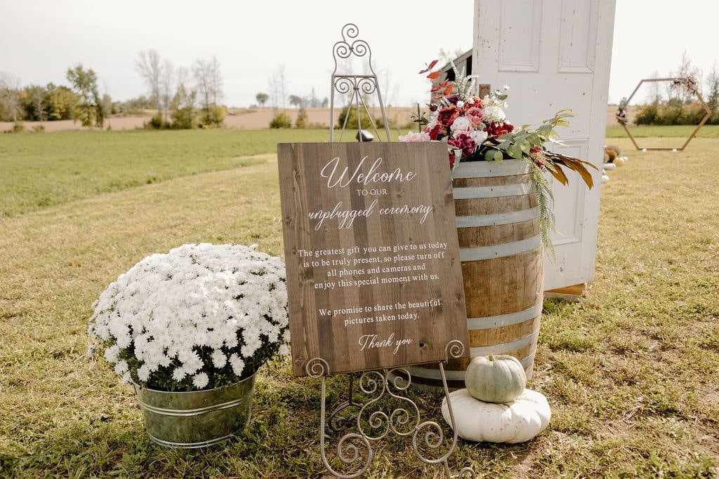 Wood wedding signage with flowers