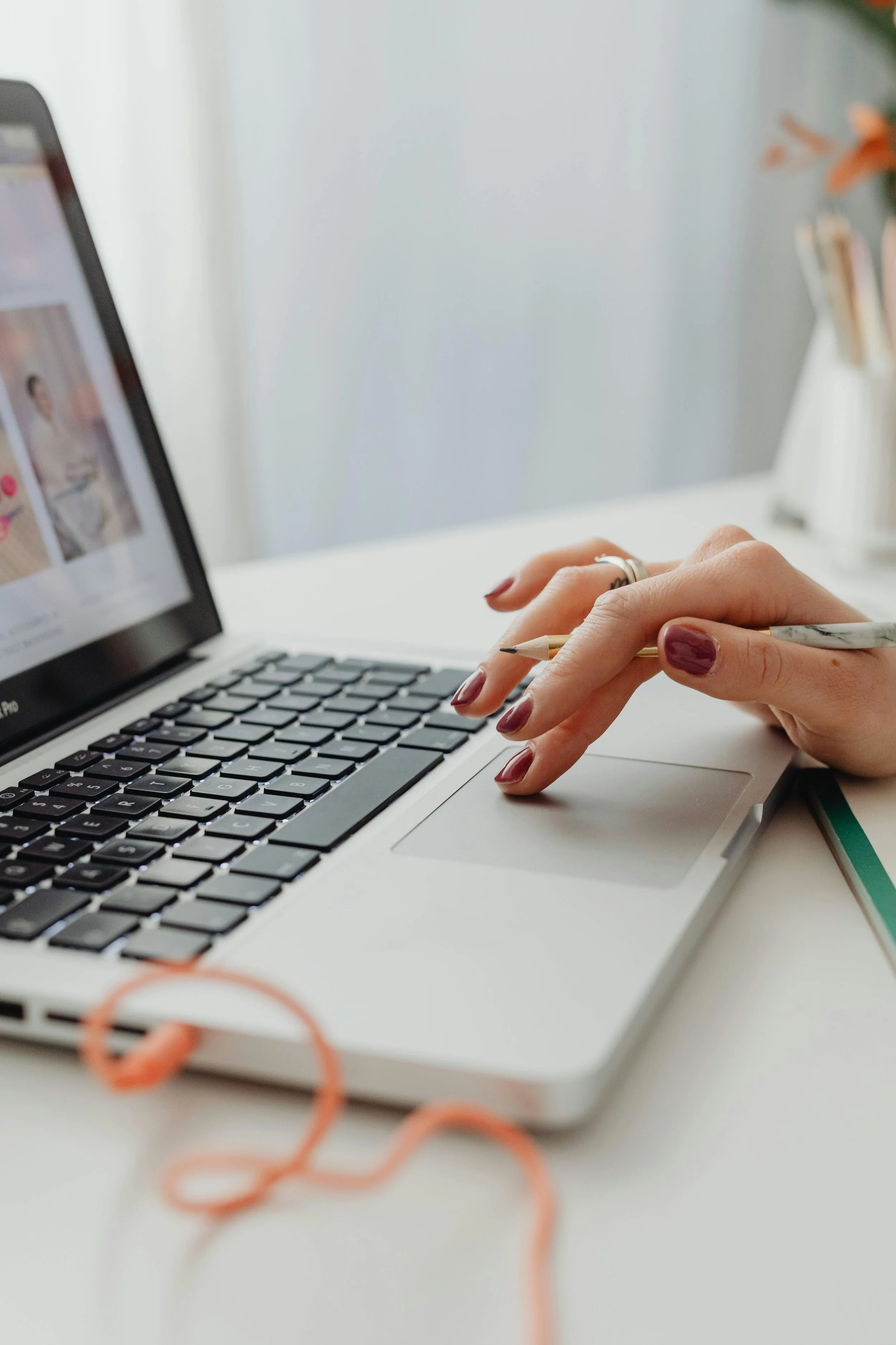 Woman typing on computer