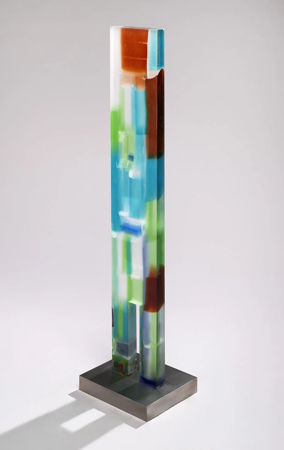 Spire 13 (47 5/8”H x 8” W x 1 3/4”D) set in a brushed stainless steel base (2”H x 12"W x 10”D)