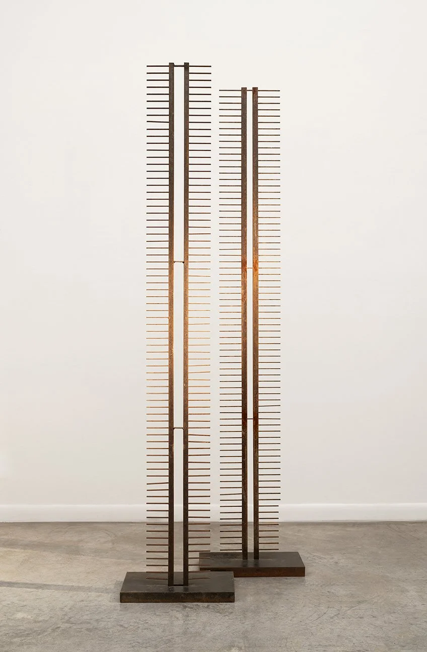 2 steel Weavings;
welded steel (6’ 4” H x 9” W x ¼” D on 2 steel bases 1 ½”H x 11” W x 9” D and 10” D)