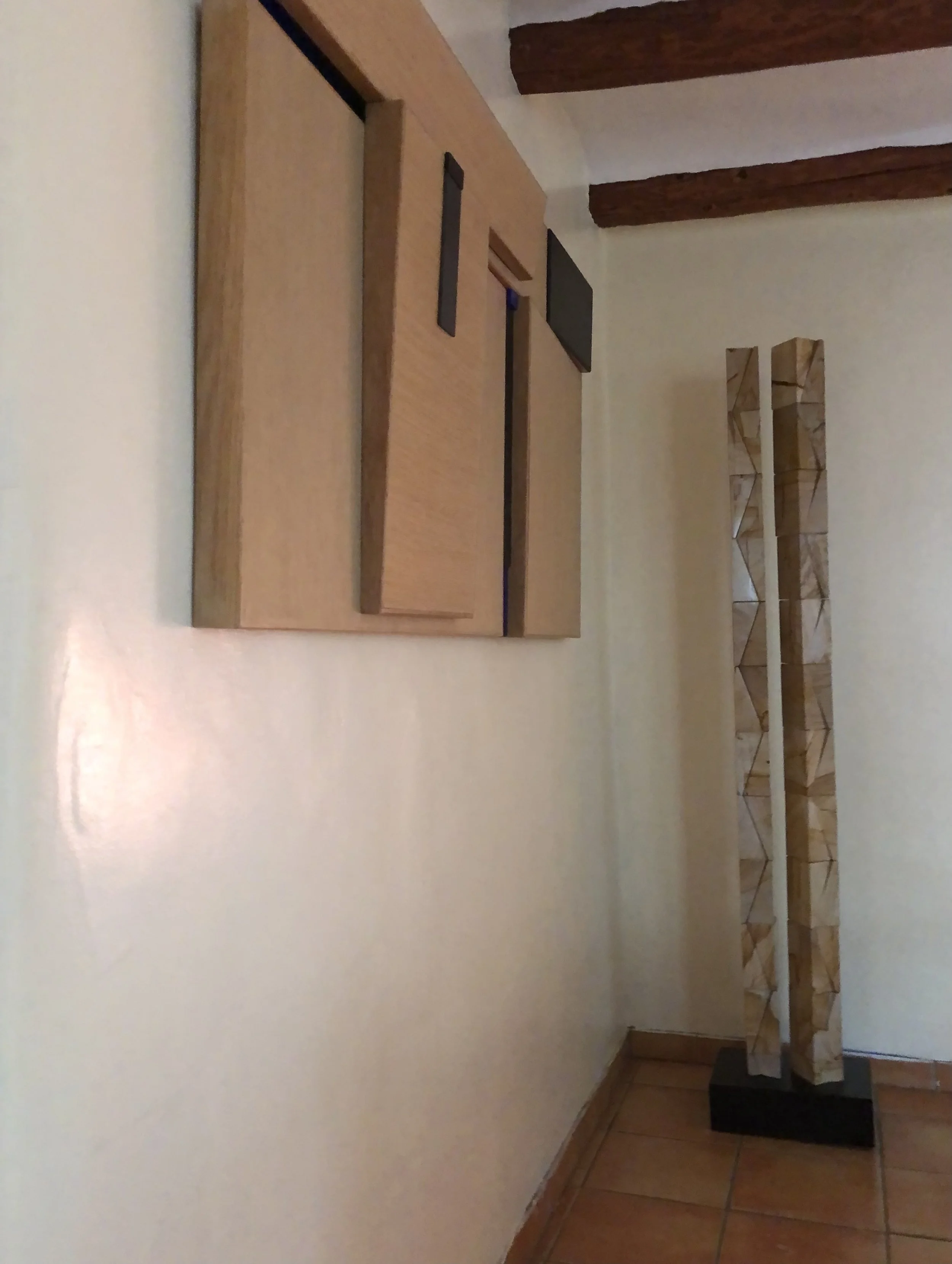 Wood and glass wall piece 72"W x 30"H x 4" D   Marble sculpture 2 spires 6'H x 4"W x 3" D