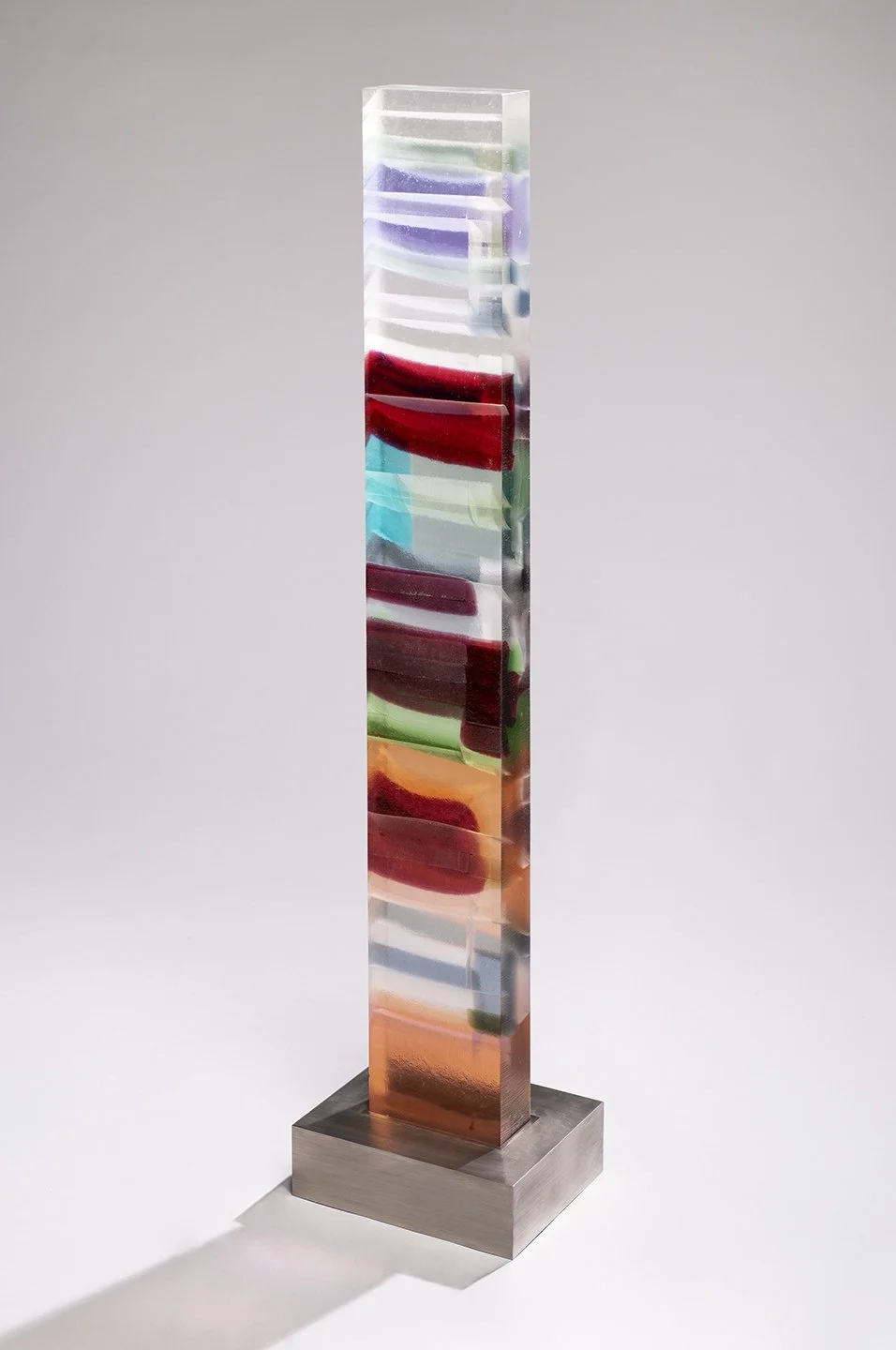 Spire 10 (43 1/2”H x 6” W x 2 5/8”D) set in a brushed stainless steel base (3”H x 9 3/4"W x 7 3/4” D)