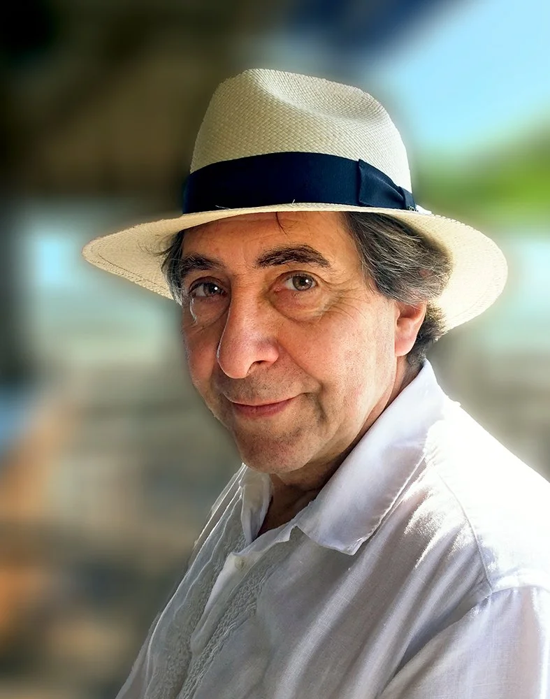 Portrait of Pierre Toutain-Dorbec, author, photographer, and publisher, wearing a Panama hat.
