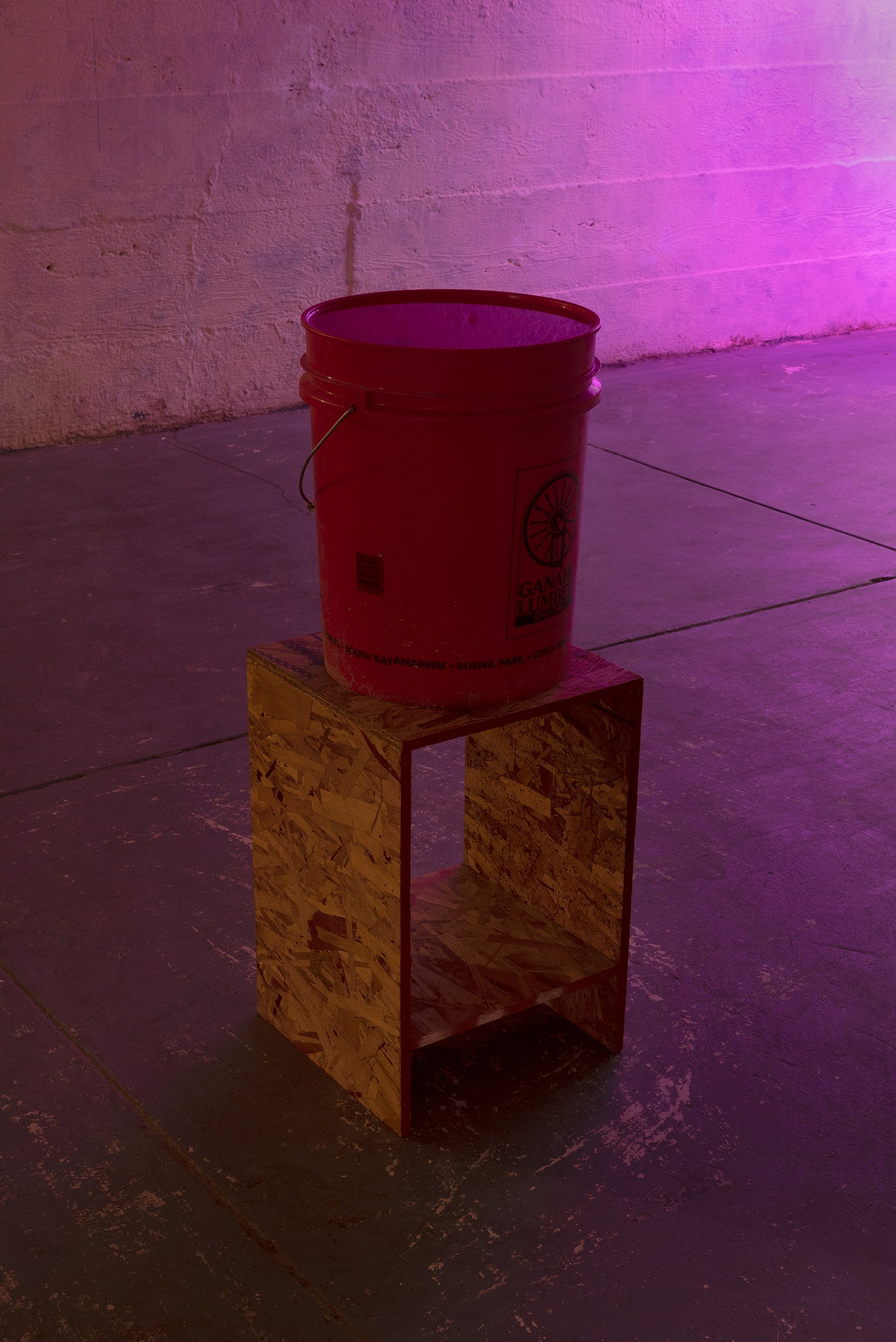 Erik Schmahl,  Untitled (Moon Trap - Prototype #2) , 2022, OSB, plastic bucket, water, 22 x 22 x 33 in. 