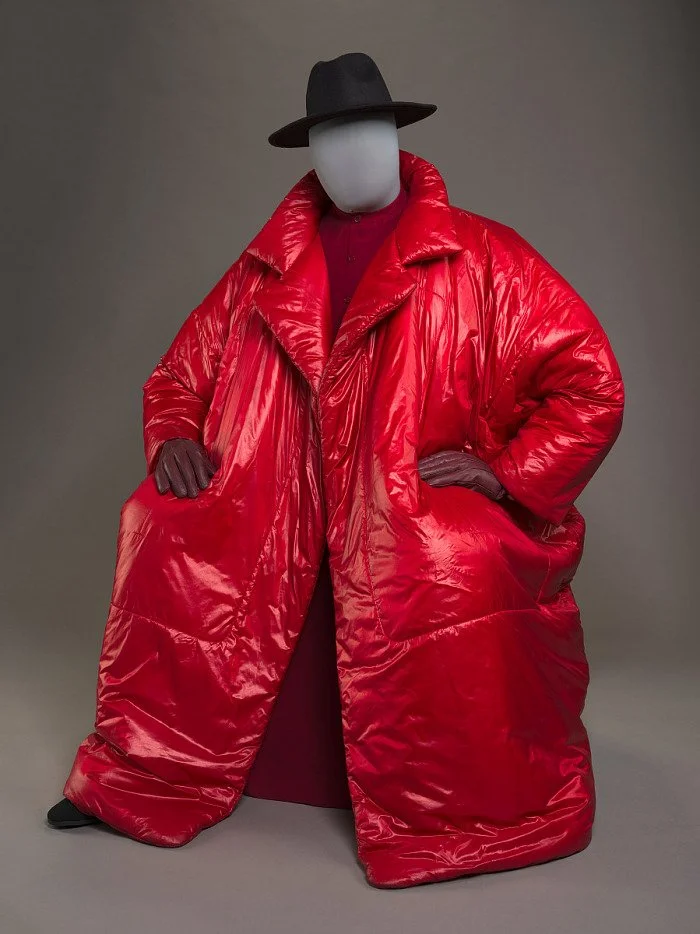 Fully custom posable mannequin for Norma Kamali puffer coat worn by André Leon Talley