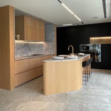 American Oak in both clear and black Japan finish and tumbled brass shadow line. #customjoinery #sublimecustomcabinetry #kitchendesign #brass #americanoak