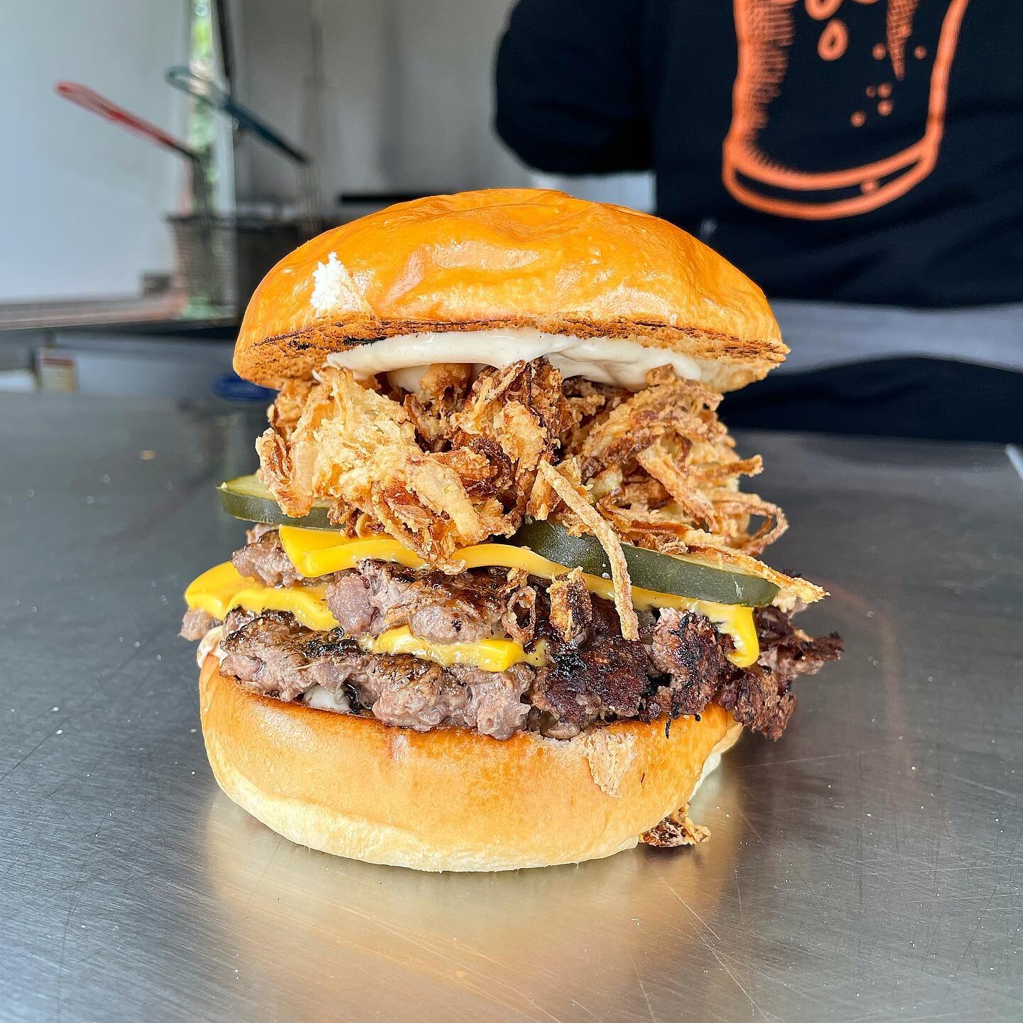 Speak easy this weekend with the Oklahoma fried onion burger 2.0. Topped with pepper aioli and stacked with shoe string fried onions!