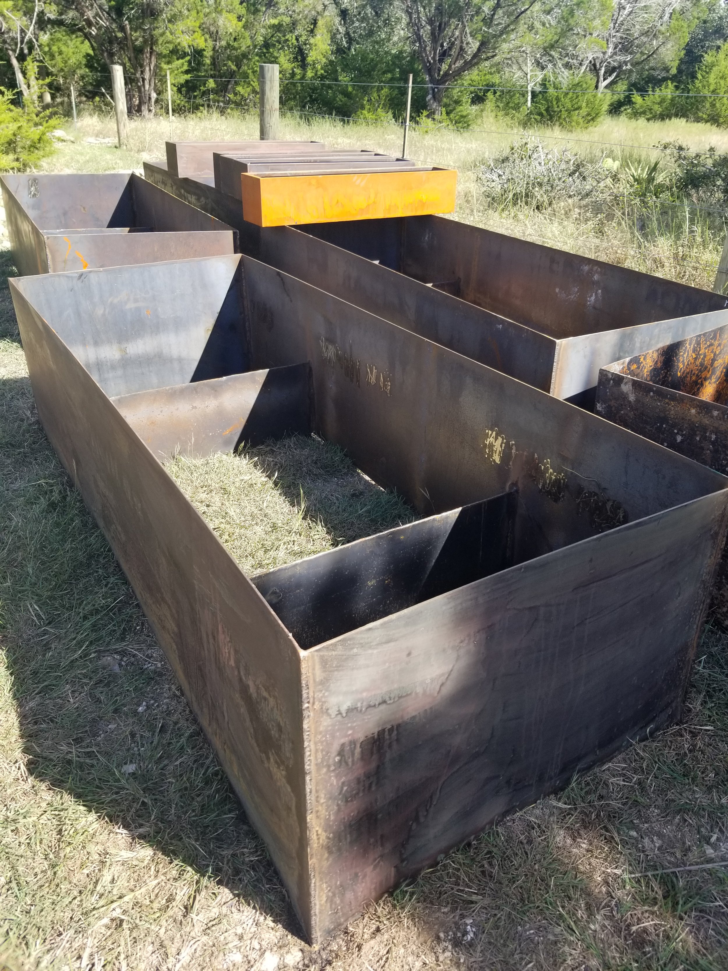 Custom crafted weathered steel adds timeless beauty to the space.