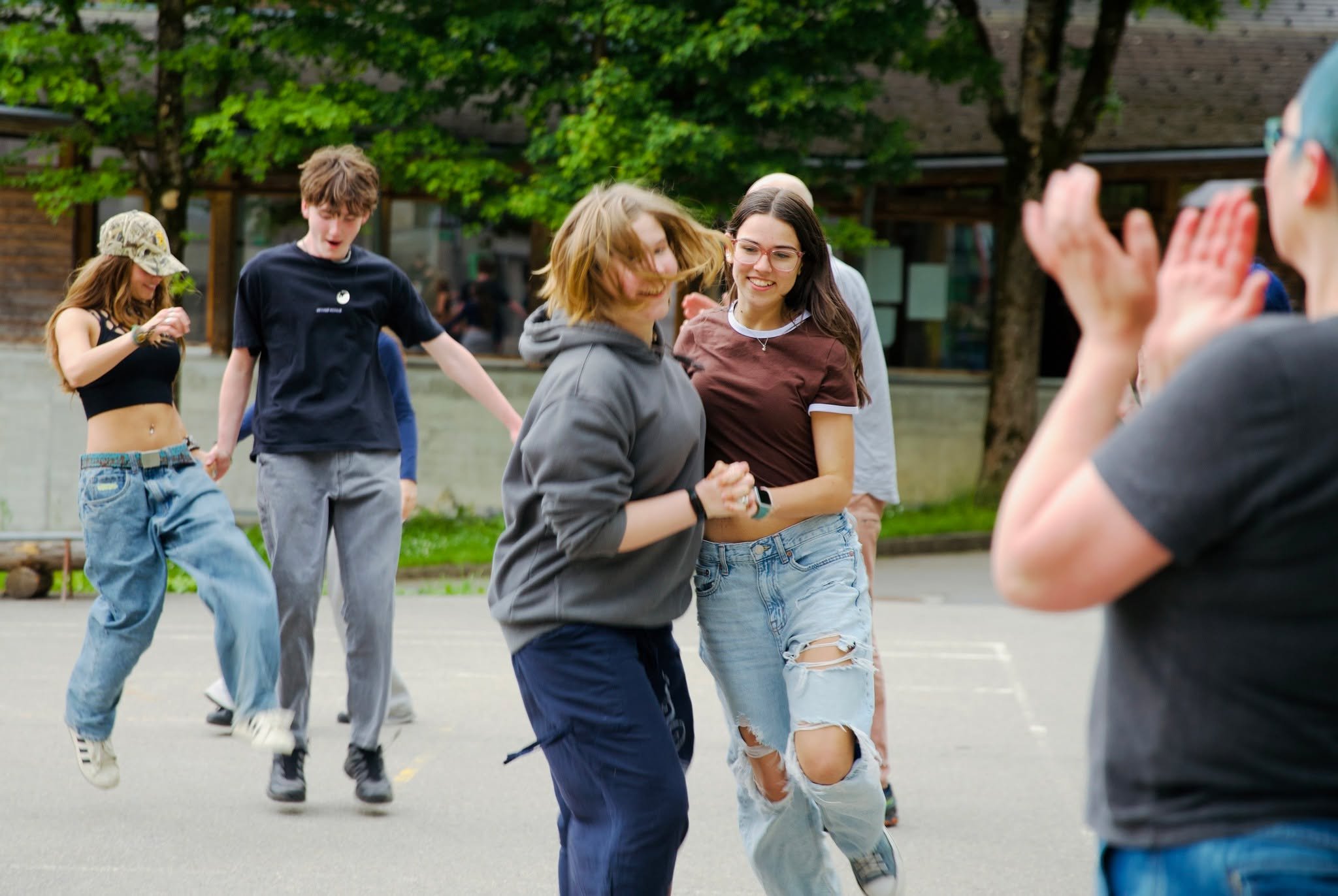 🕺🎶 The sun is back across campus, bringing a sense of spring.

Before the warmer terms begin, a look back at a folk dance evening from May 2025.

Ecolianers dancing, playing, chatting. The Platz is alive. #community

&middot; &middot; &middot; ✦ &m
