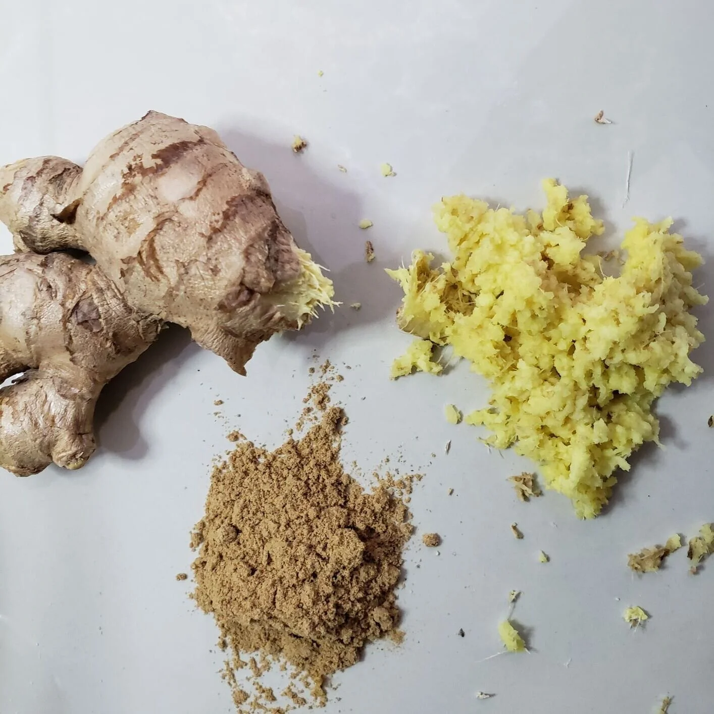 fresh ginger root, ground powdered ginger and fresh grated ginger