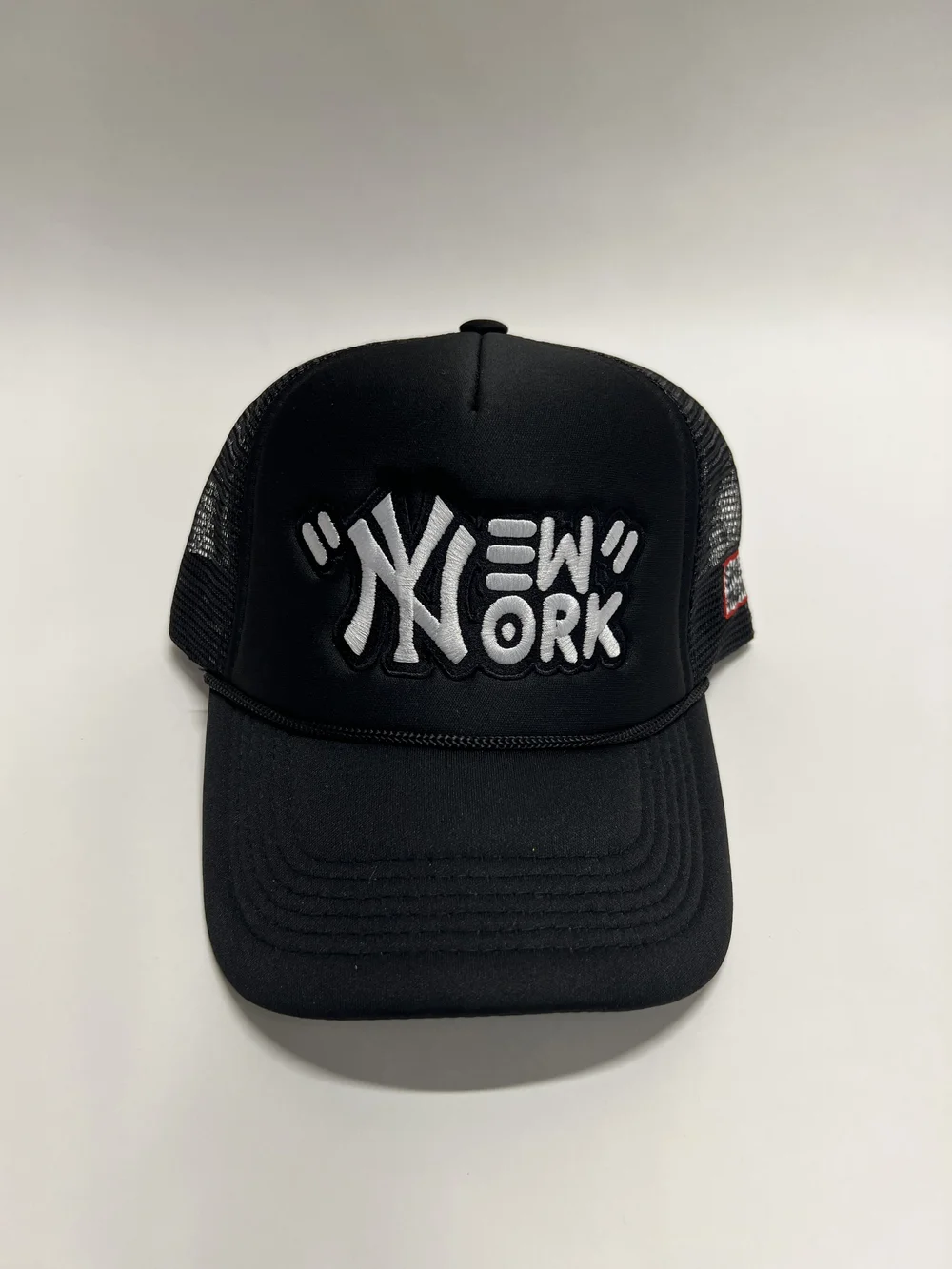 black ny trucker hat