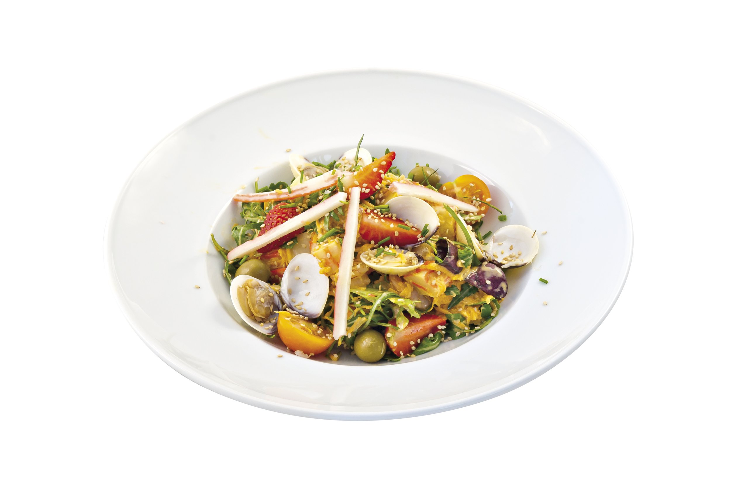 Gourmet seafood salad with clams, crab meat, seaweed, and vegetables on a white plate.