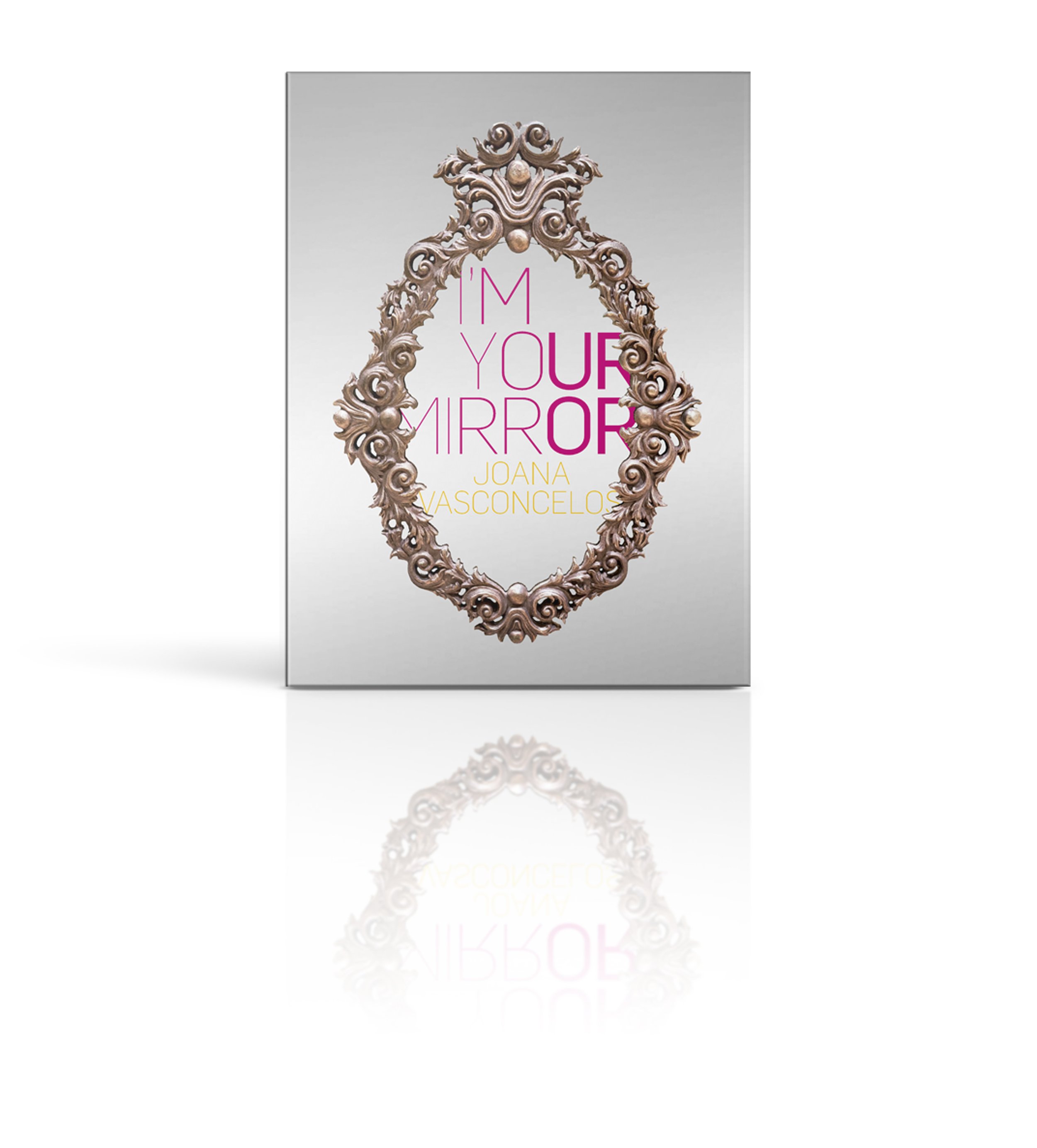 Decorative mirror frame with 'I'm Your Mirror Joana Vasconcelos' text on reflective background.