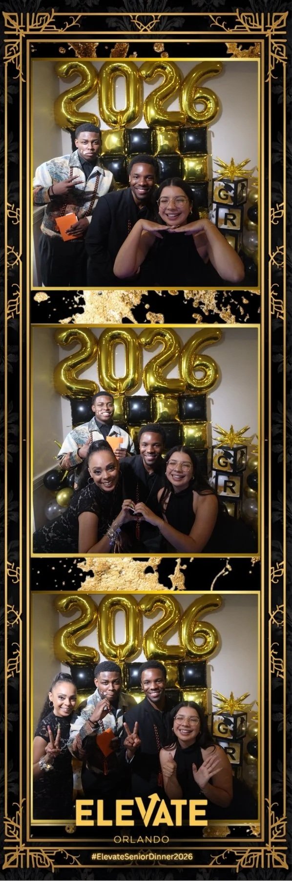 Photo booth strip with three pictures of five people celebrating a graduation in 2026. They are posing in front of a backdrop with gold and black balloons, including large gold numbers '2026'. The border of the strip is decorated with a gold and black design. The event is labeled 'ELEVATE ORLANDO' with the hashtag #ElevateSeniorDinner2026.
