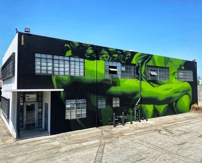 🖤💚🖤 A big, beautiful embrace by @zoueh_skotnes for the 2021 festival 🖤💚🖤

📍 Modernica on Saco St

📢 Big Thanks! to our amazing 2021 sponsors!! @giphyarts 🦠 @kobrapaint 🎨 @liquiddeath ☠ @1111.projects 🖌 @modernica &amp; with help from membe