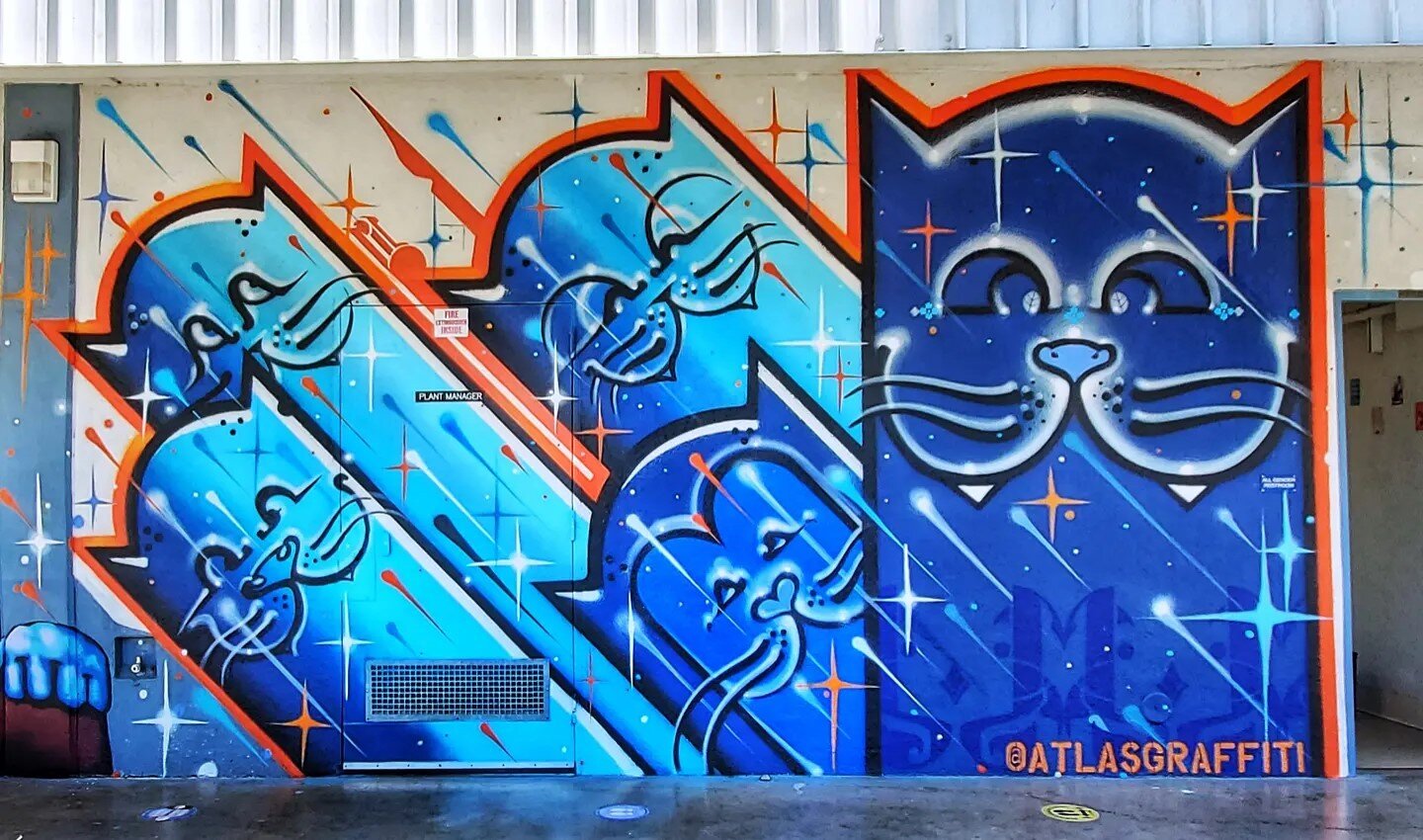 🧡💙😺 Watching this mural come to life during the week of the festival was truly an incredible experience! @atlasgraffiti is a master of his craft with an immense toolbox of techniques to draw upon while creating his work &amp; he pulled out all the