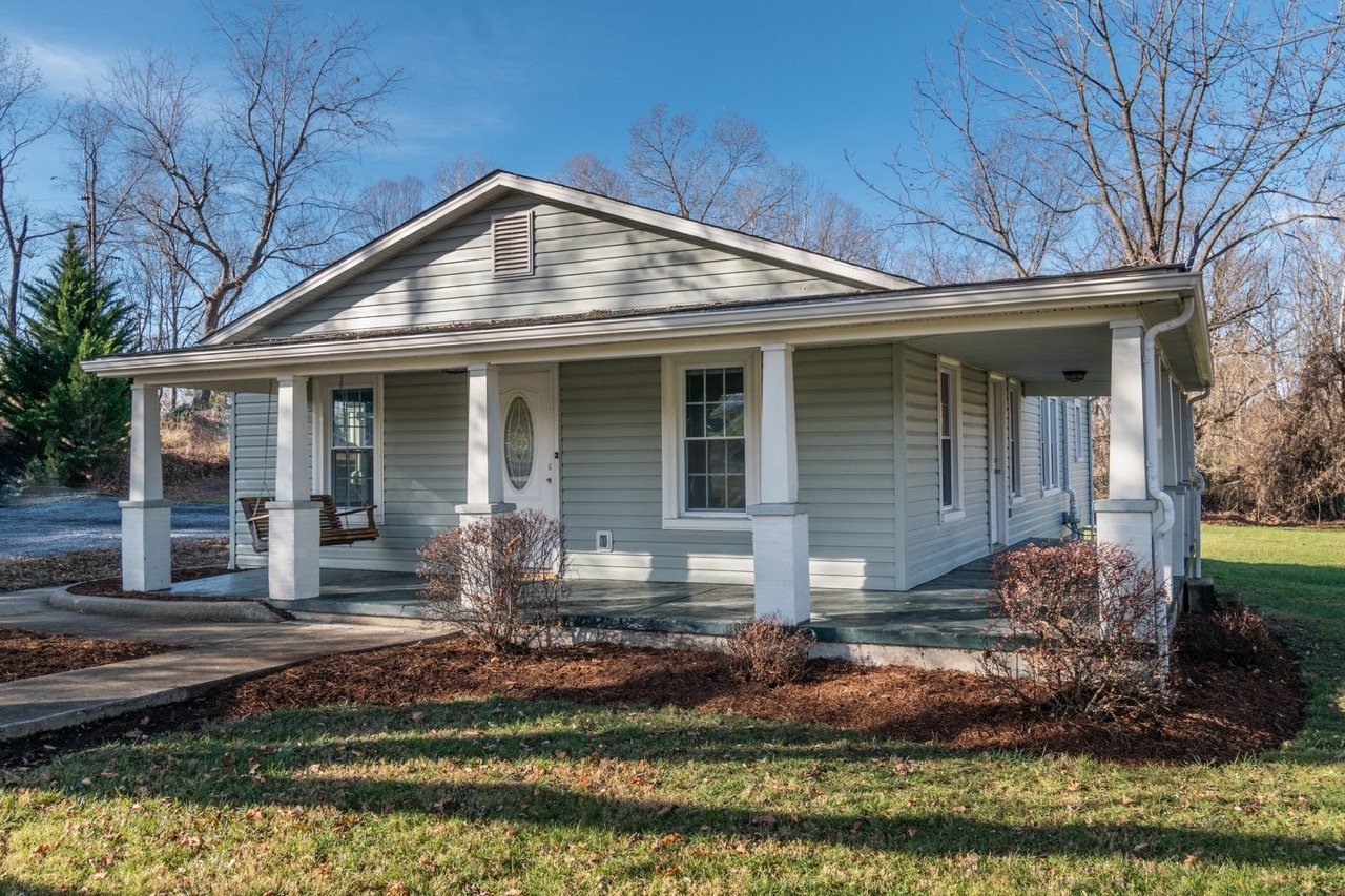 Photo - Adorable 1920s bungalow with wraparound porch located at 3706 E Side Highway in Augusta County, VA. Sellers represented by Sophie Bergquist.