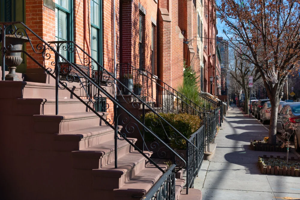 Brownstone-lined street in Jersey City Heights