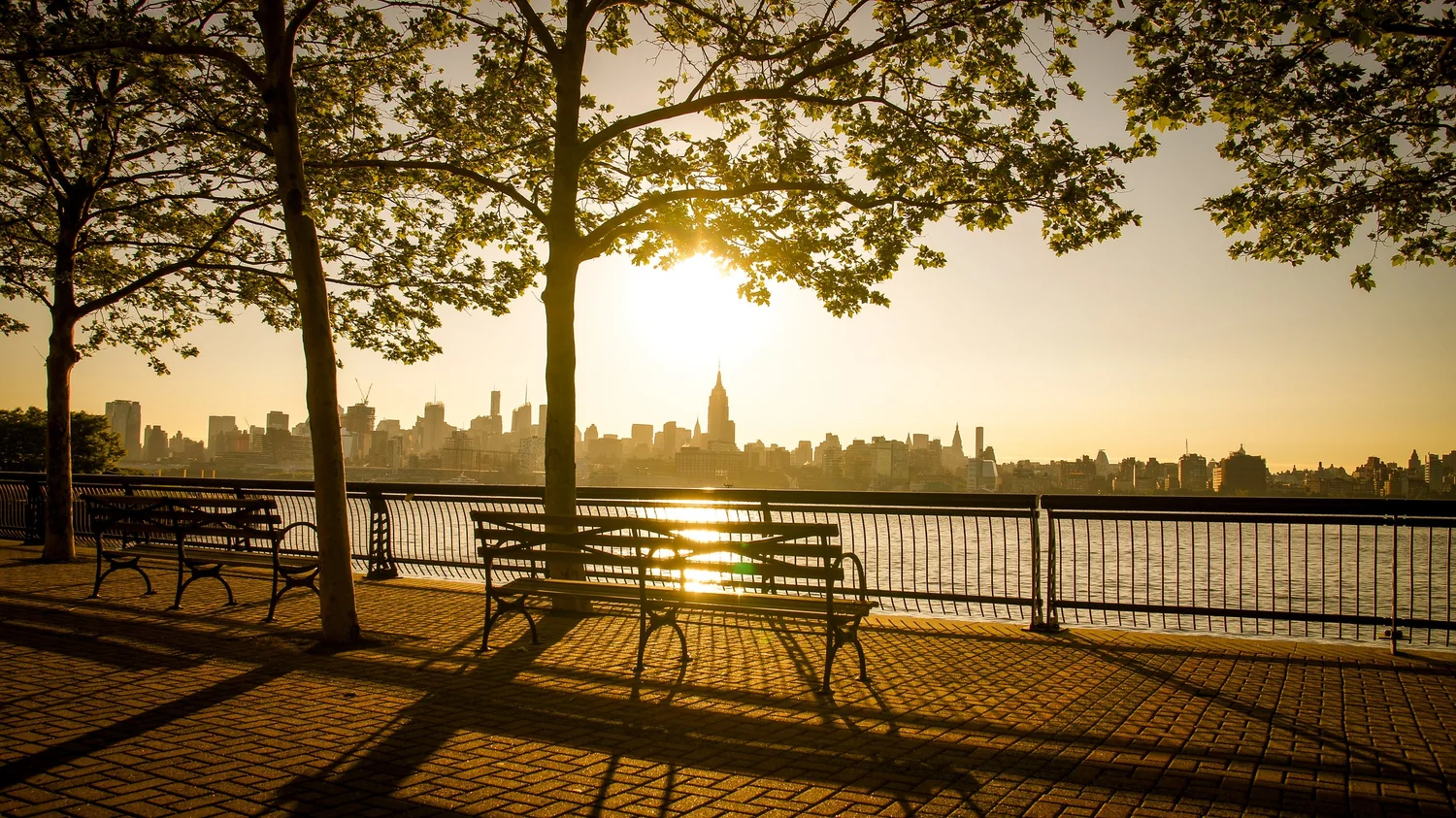 Hoboken NJ skyline and Hudson River waterfront at sunset