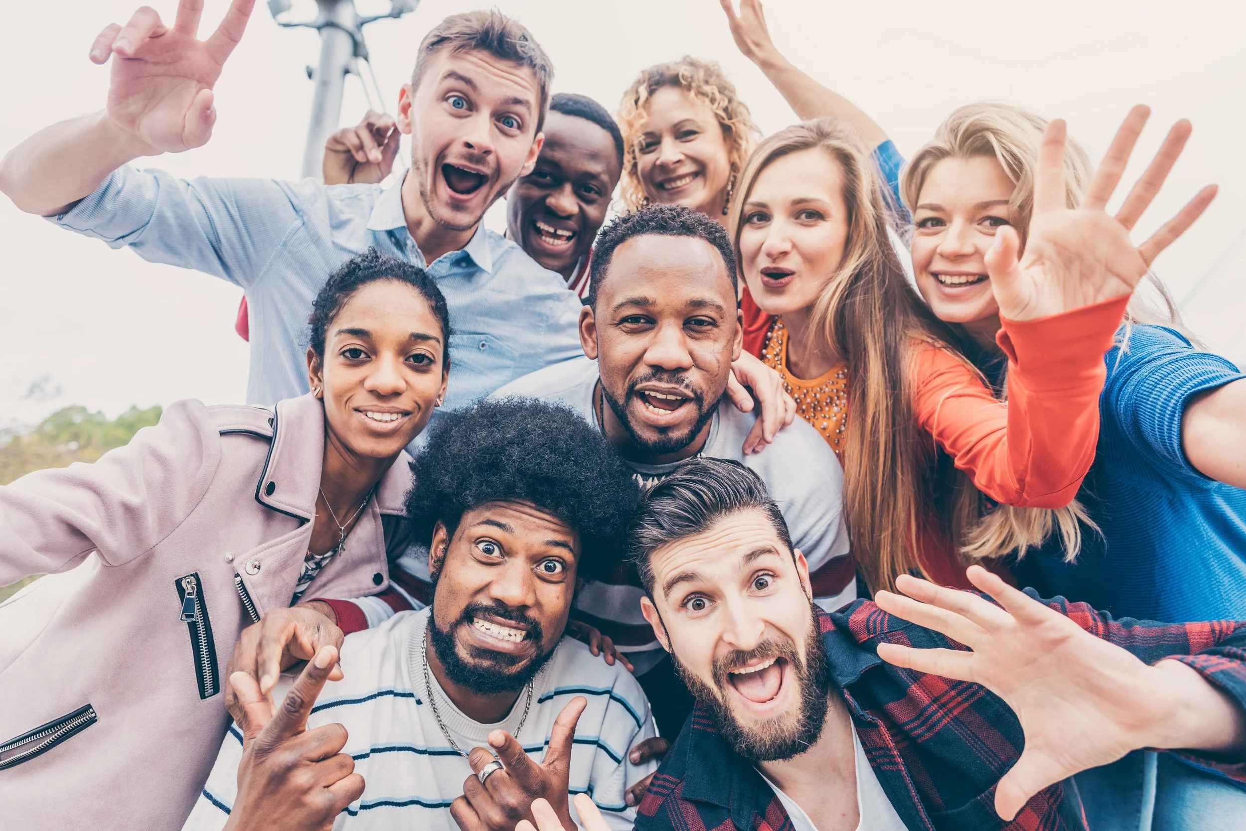 Group of people from diverse backgrounds smiling together