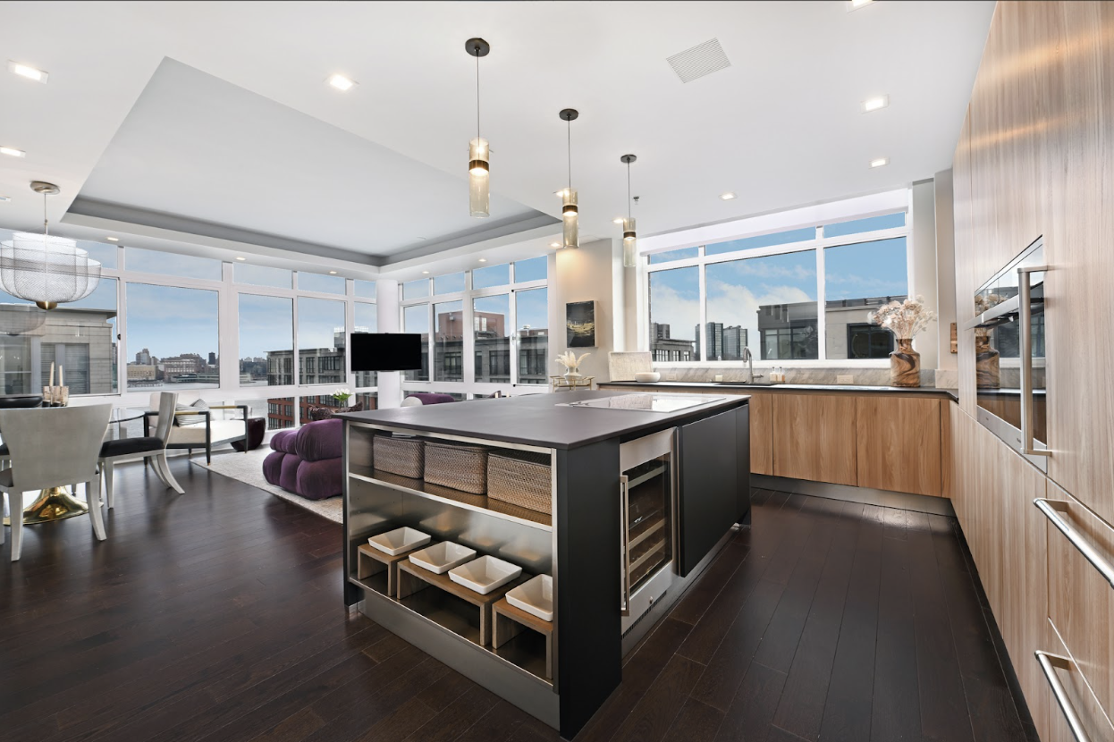 Modern Hoboken condominium interior with open floor plan and city views