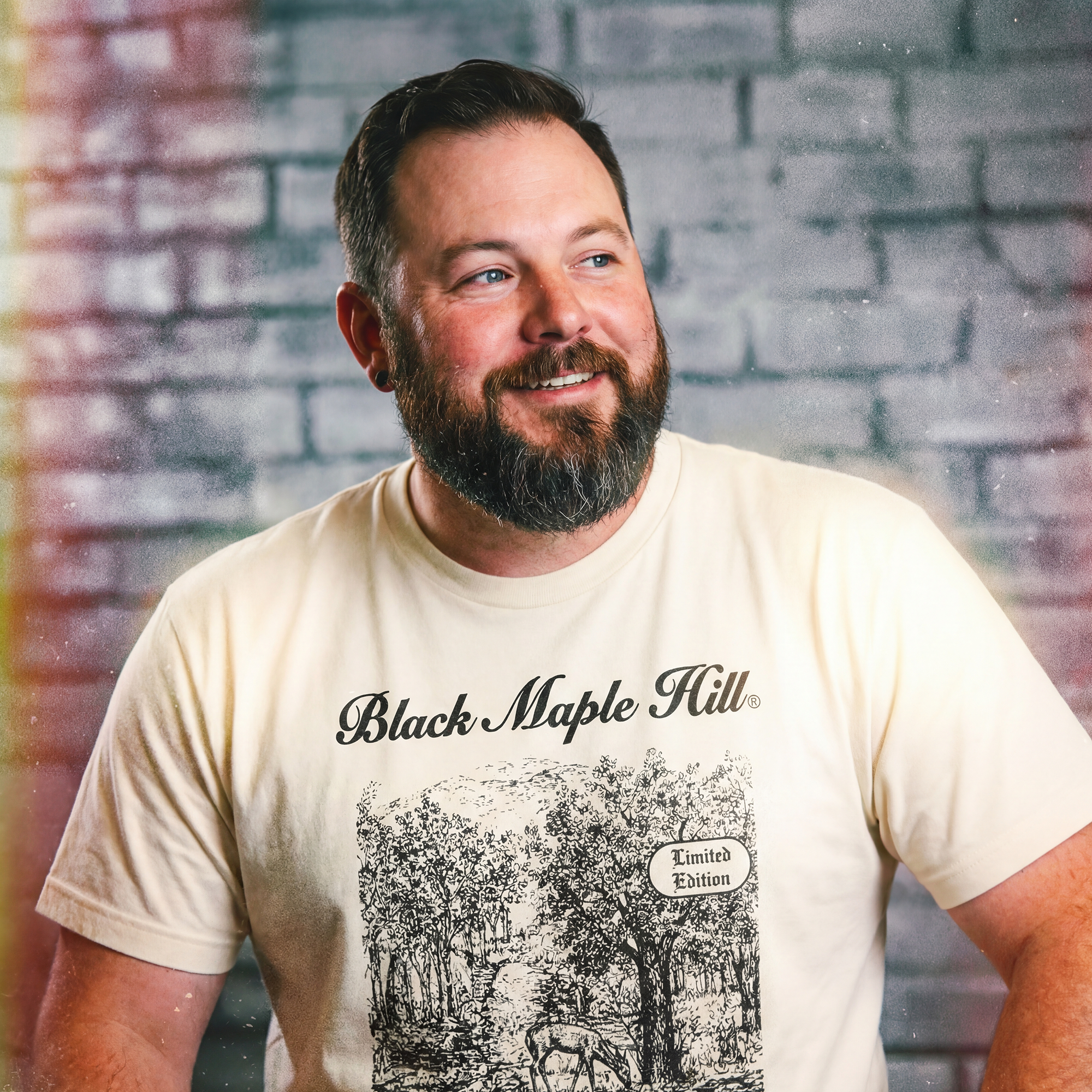 20260212_BMH_Merch_BaseTshirt_IvoryShirtBlackPrint_Shop_5.png