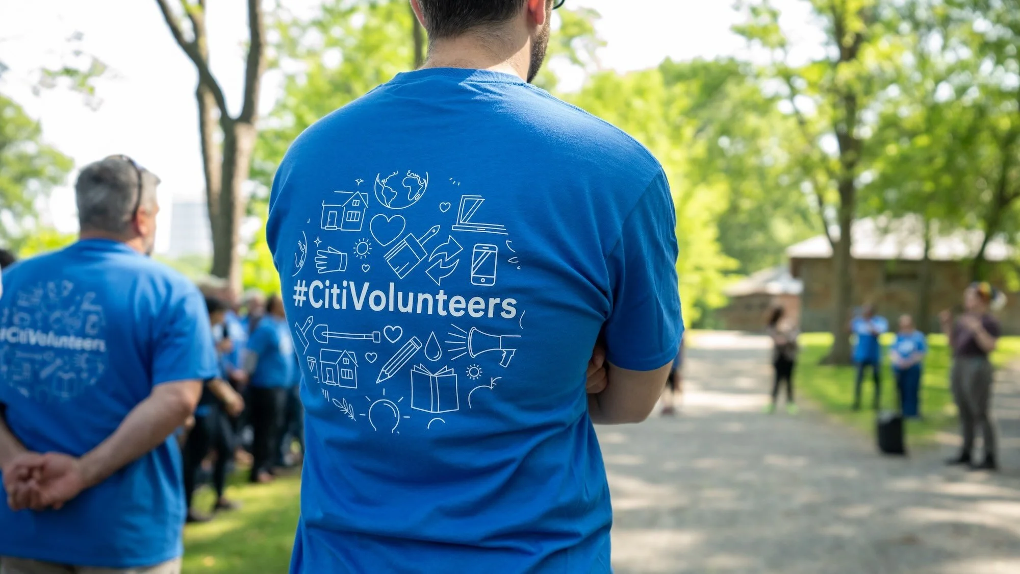 Close-up of a volunteer planting at the event, photographed by Bunker Hill Media for Citi’s internal and social media use