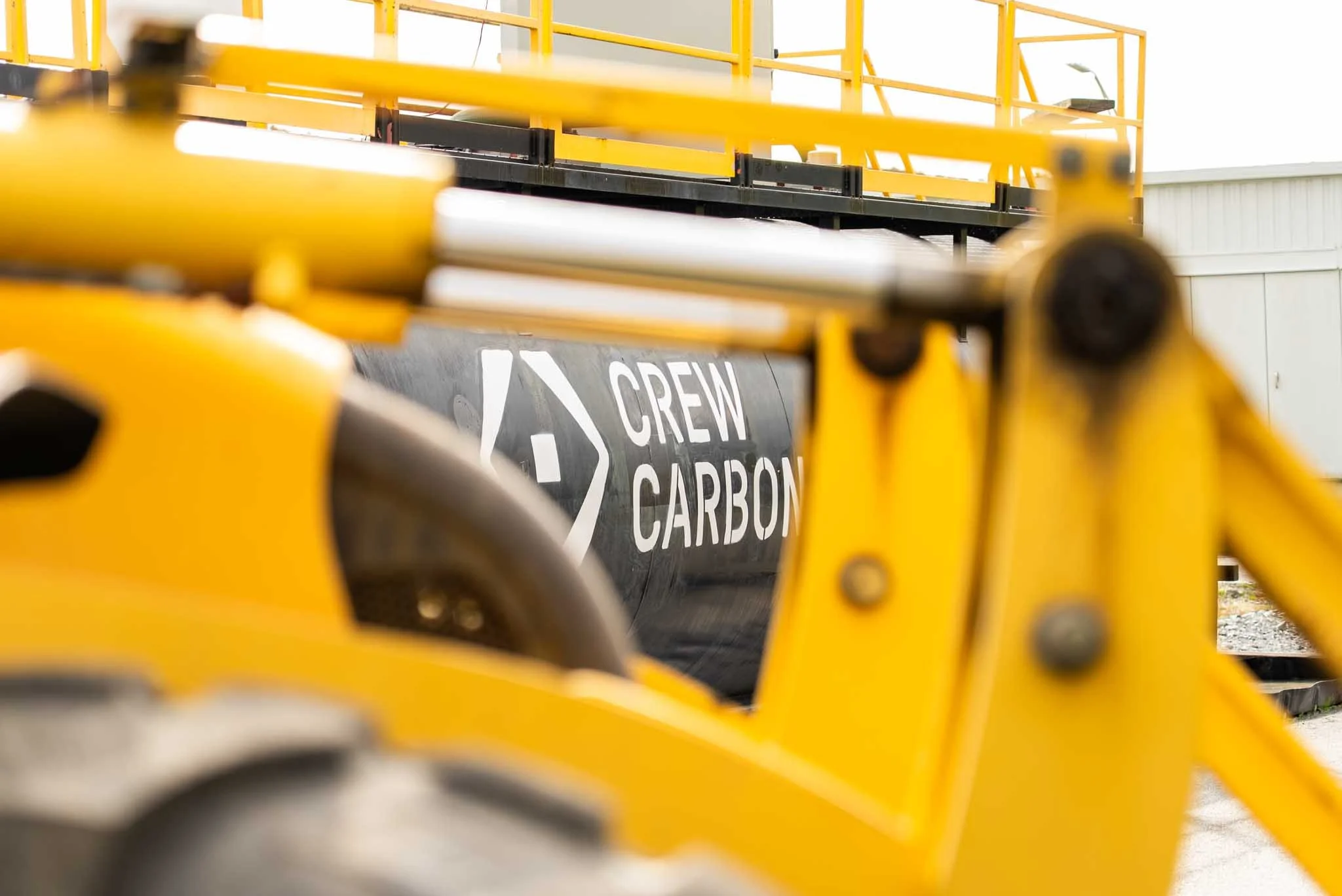 Boston video production drone footage of wastewater treatment plant with aerial view of tanks and processing systems for corporate video production