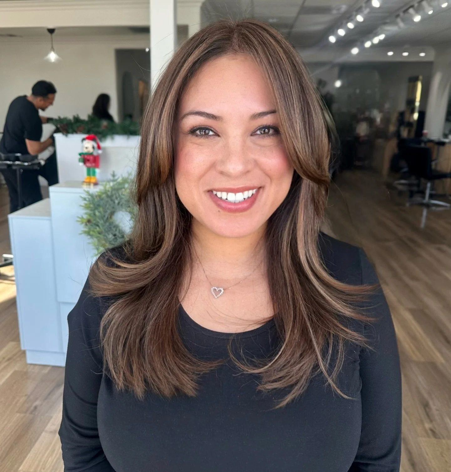 Revitalized this brunette's locks with Redken hair color, eliminating warmth and adding shine. Finished with a layered cut and a sleek blowout for effortless movement and a polished finish. ✨ Healthy color. Seamless blend. Low-maintenance results. 


