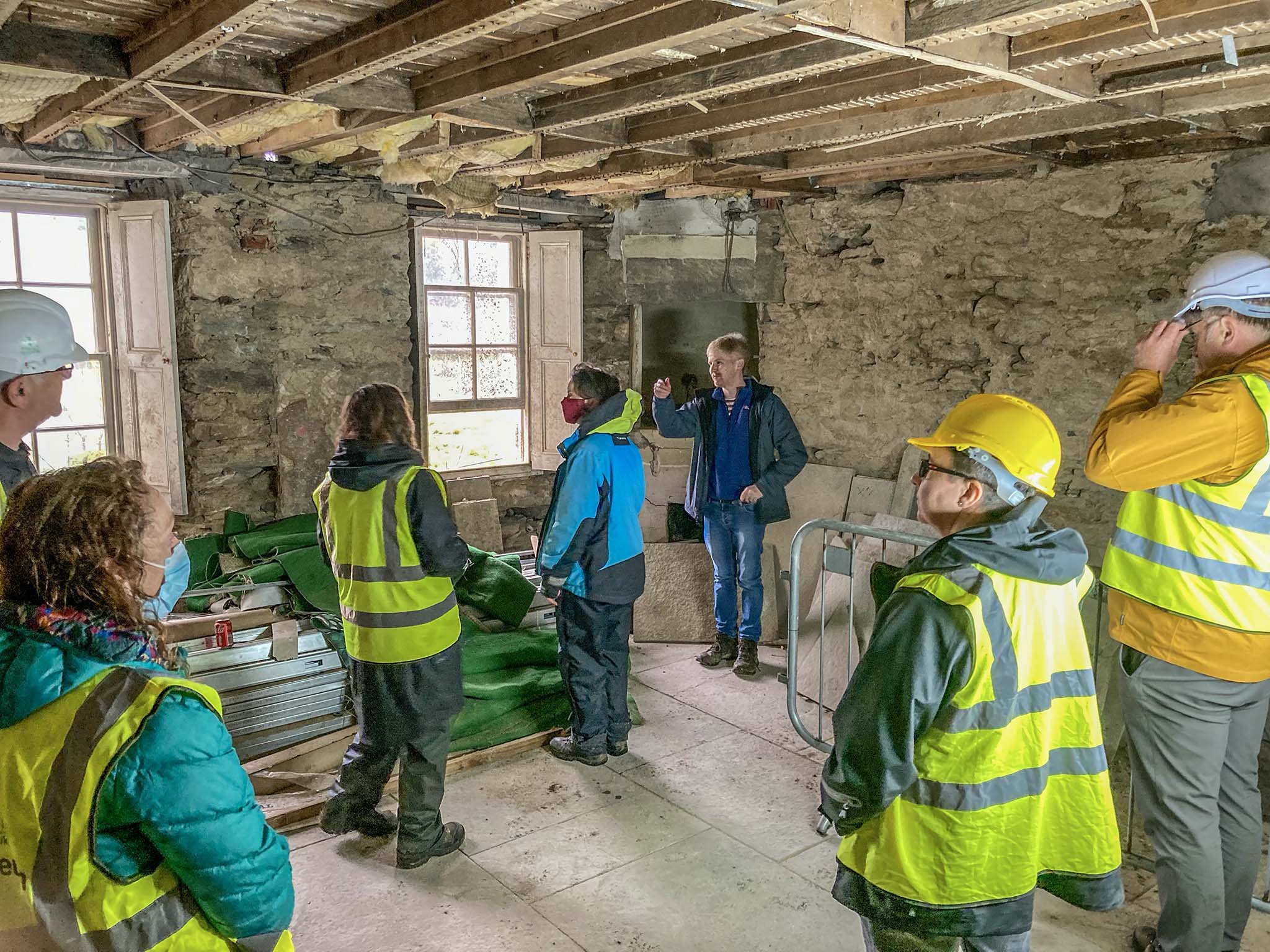 Museum staff reminisce within what remains of the old Museum Gallery. 