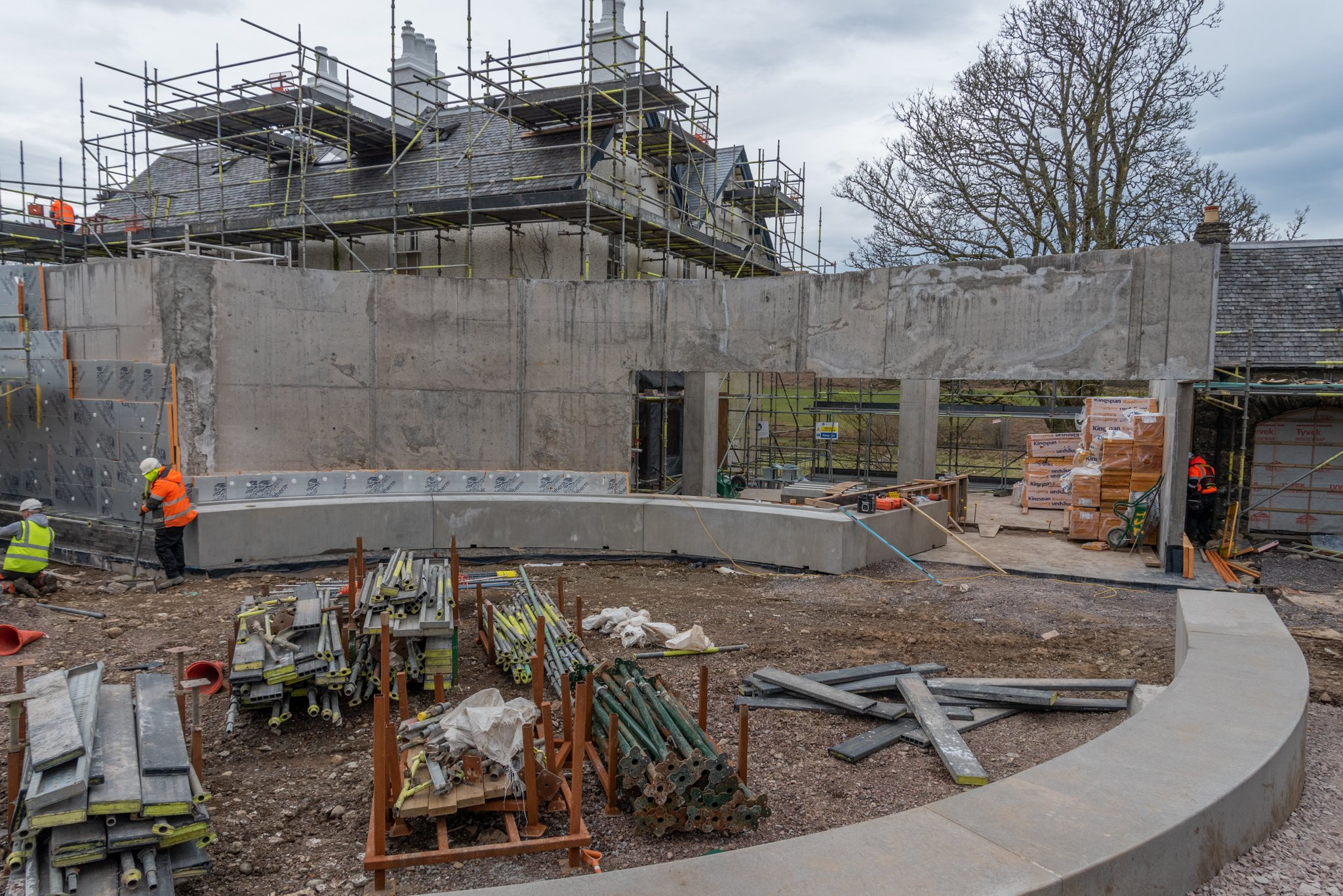  The circular feature outside the Visitor Entrance takes shape, with the curved facade of the new Reception, Shop and Exhibition space beyond. 