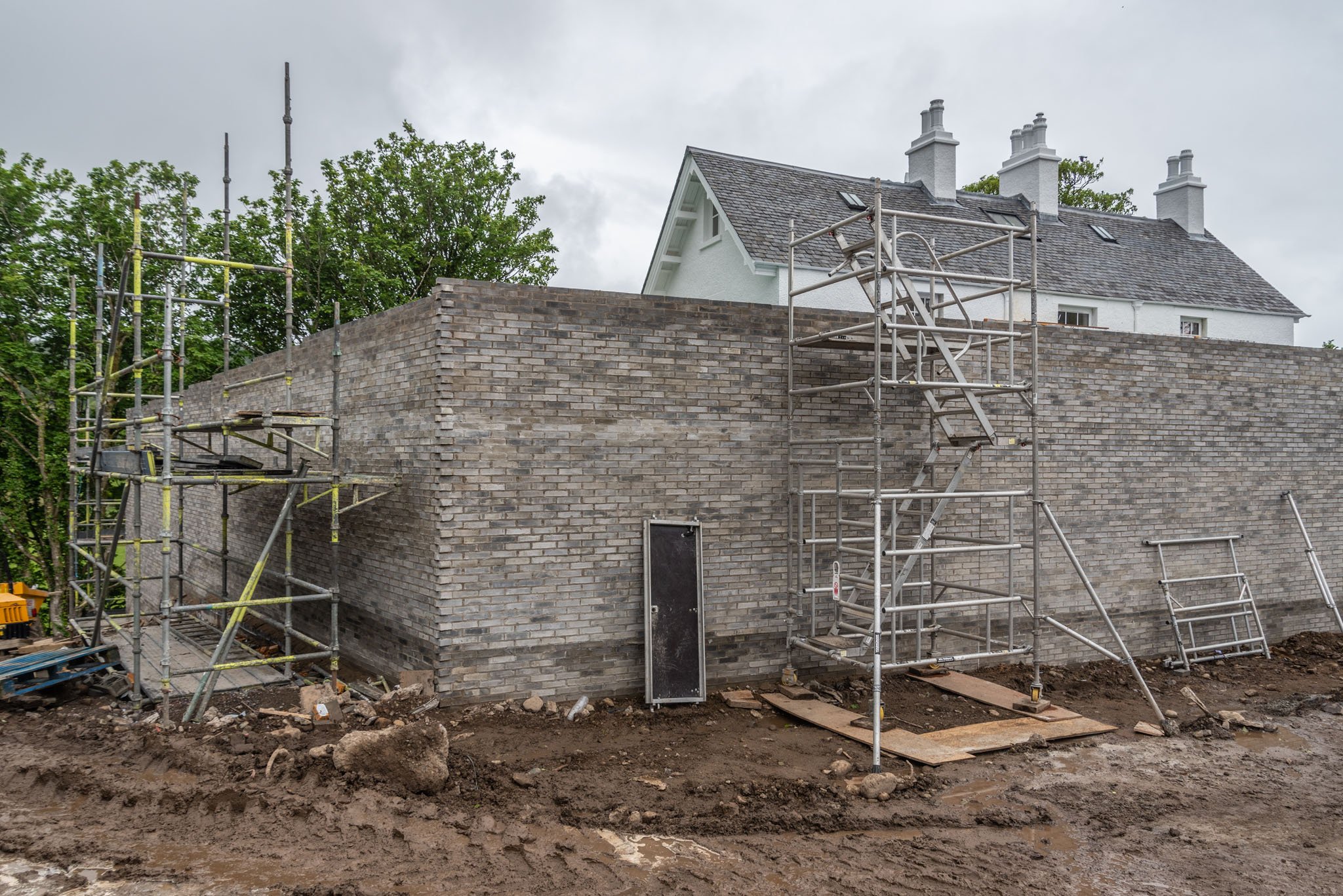  Walling taking shape on the exterior facade of the Exhibition spaces. 