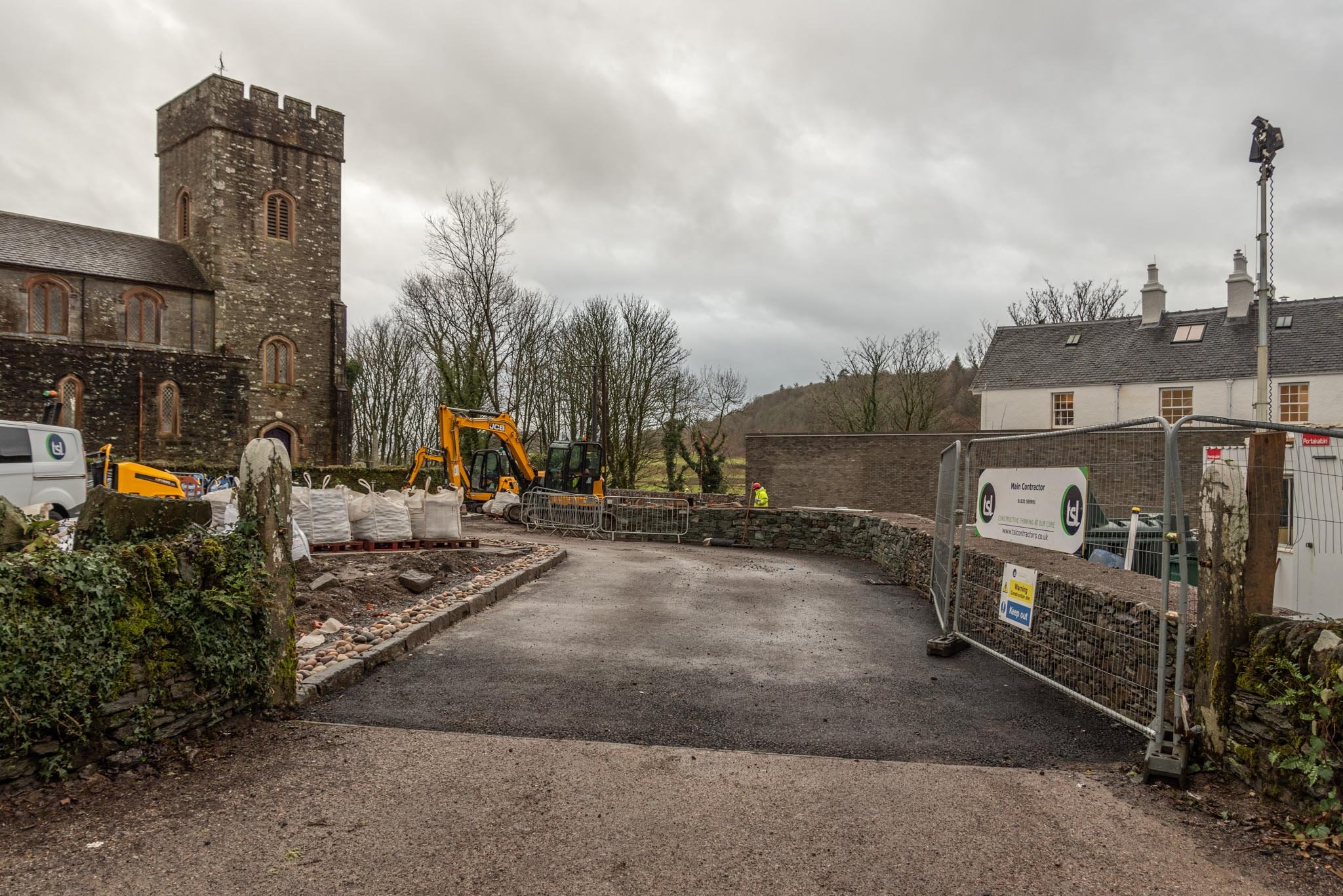  Construction of the new vehicle entrance, giving access to a revamped and resurfaced car park. 