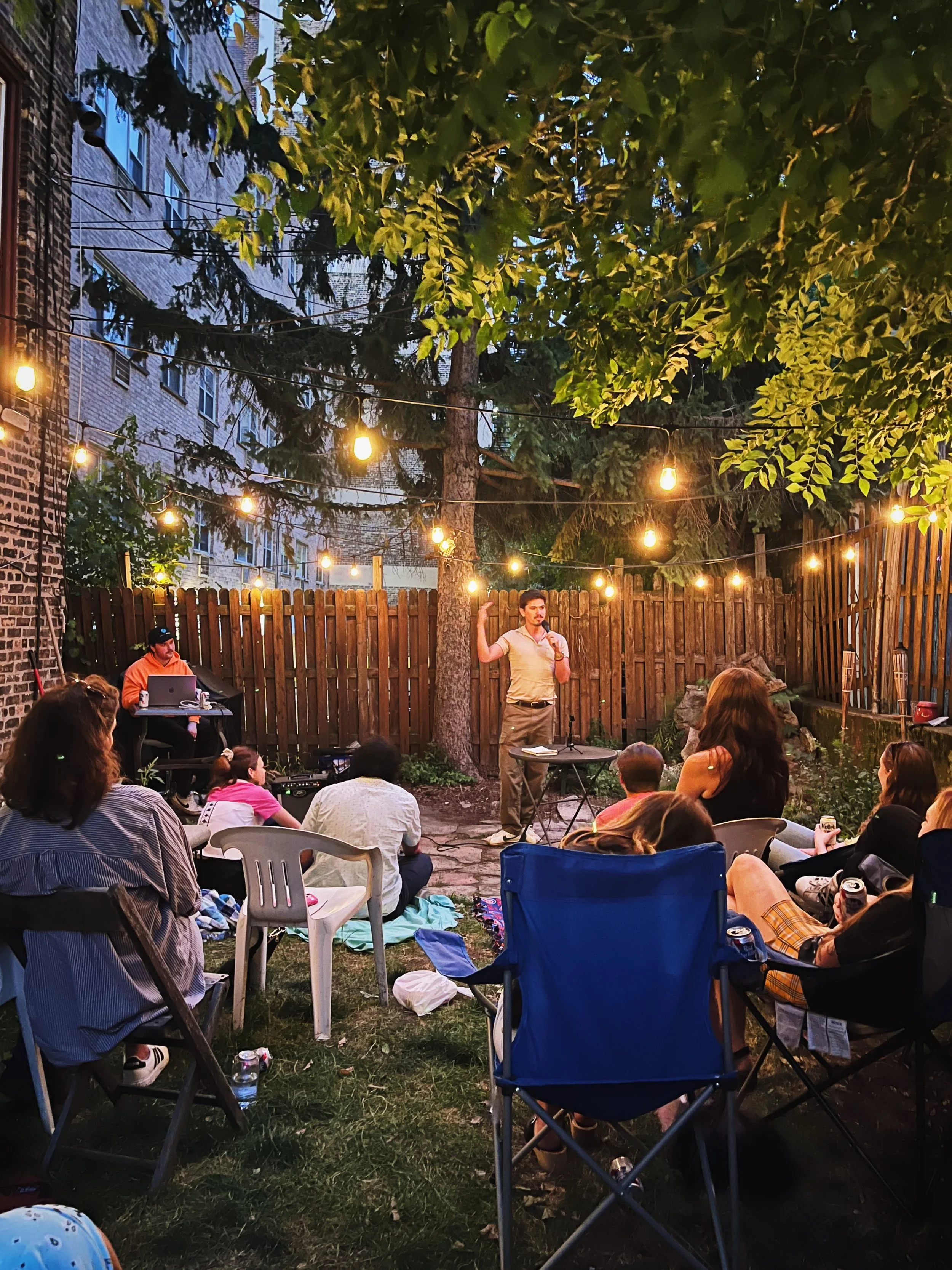 Performing standup at "For The Worms," 2023. Photo by Grace Goze.