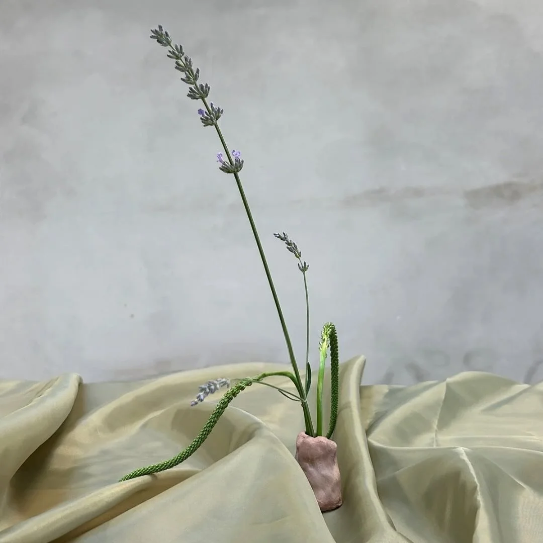 Eid Dinner Details 

The table design intended to capture the essence of organic beauty and community. The handmade clay vases, each uniquely imperfect, hold wildflowers picked on the walk to the venue, embodying the spontaneous generosity and grace 
