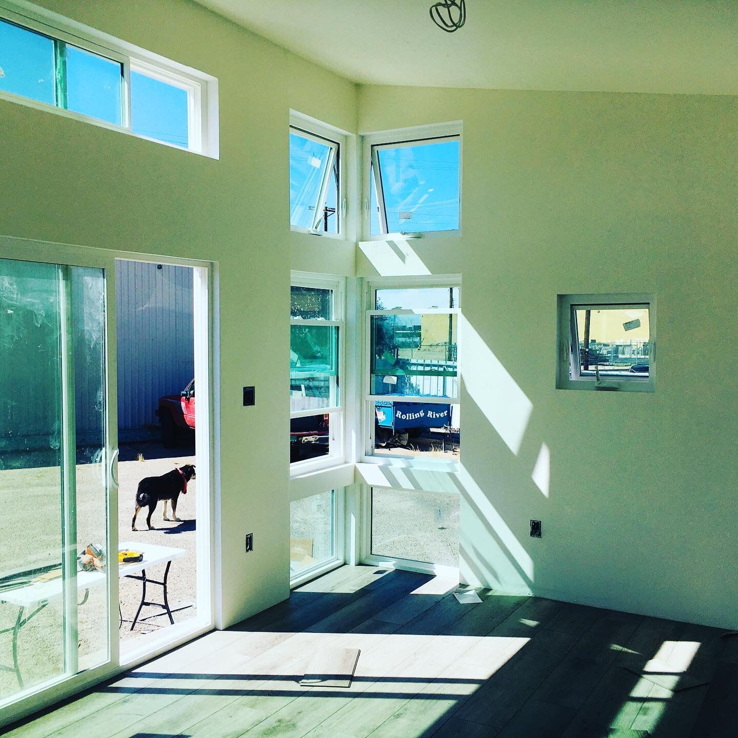 One of our Precipice Houses getting flooring! Loving the interior space of the 12&rsquo; width with high ceilings!