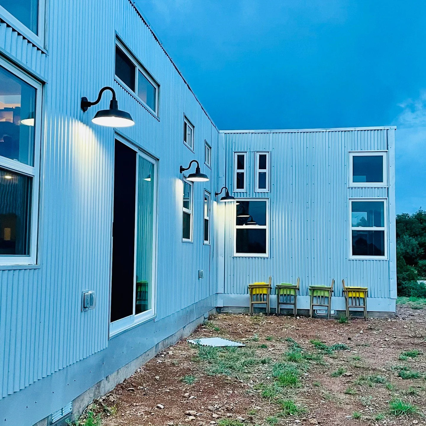 520sf two-module house placed outside of Silver City last summer. Gorgeous view of the valley and copper mine in the distance!