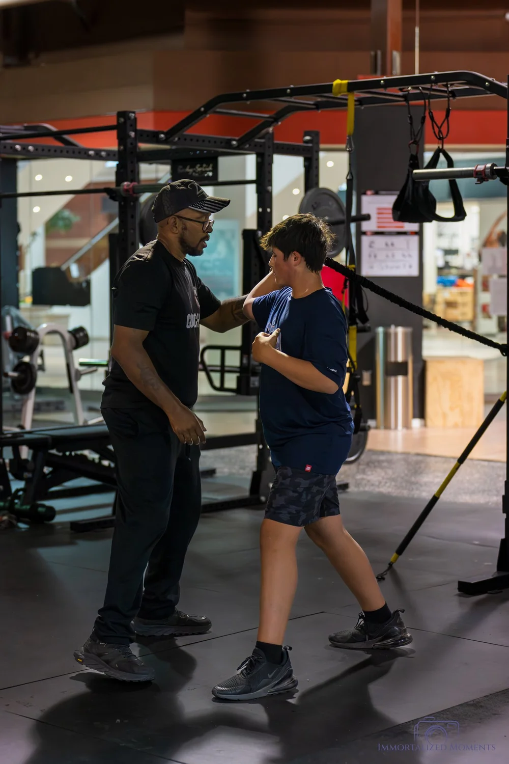 Coach working one-on-one with an athlete