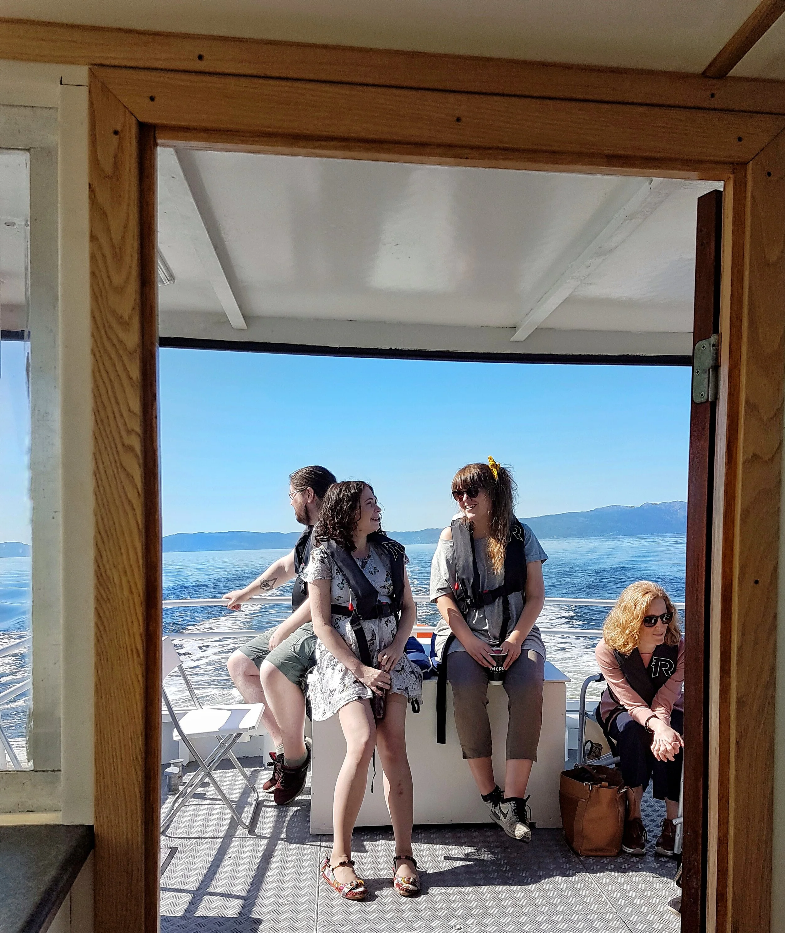 group girls ranja backend fjord blue sky.jpeg